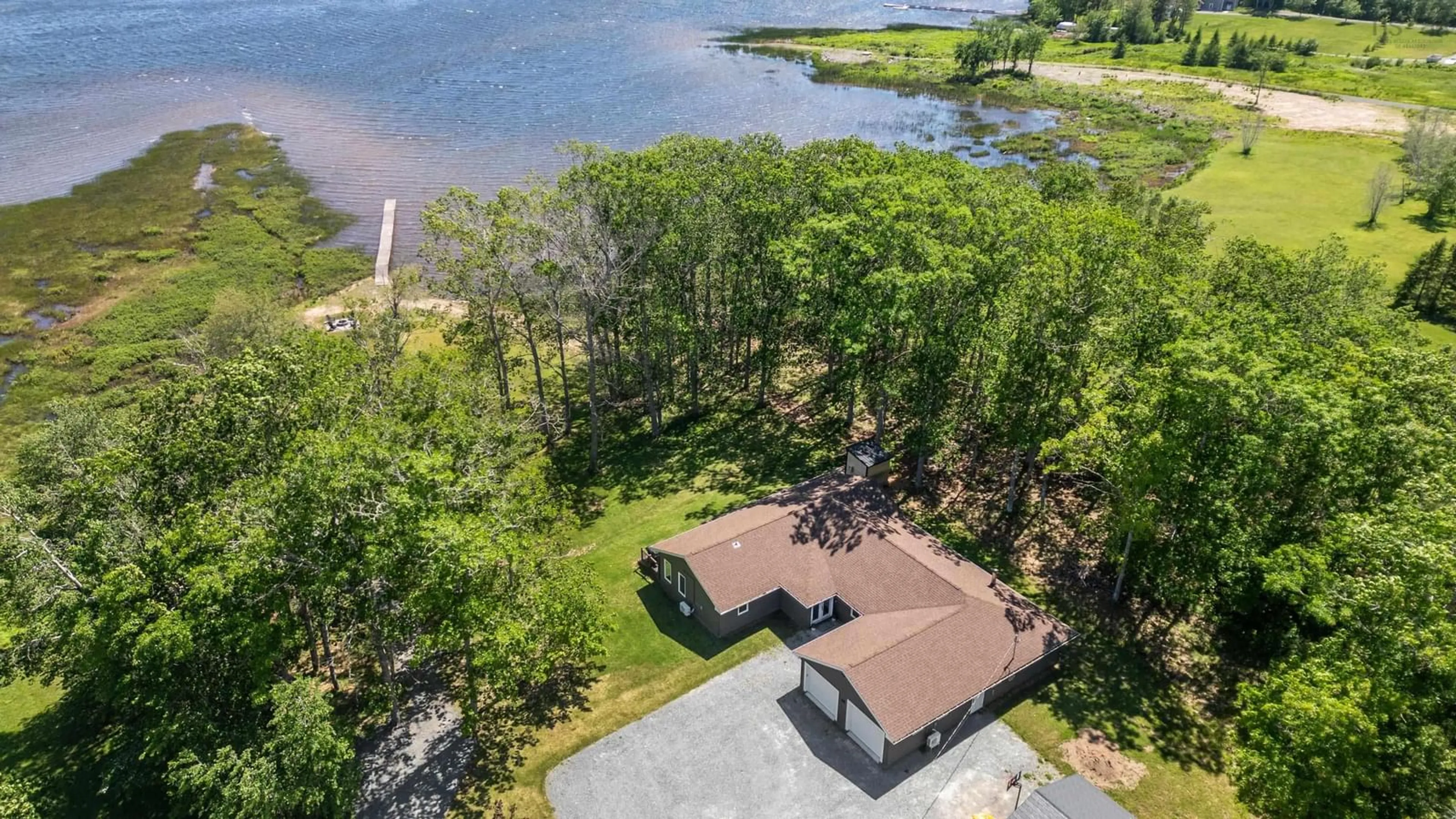 A pic from outside/outdoor area/front of a property/back of a property/a pic from drone, water/lake/river/ocean view for 40 Martins Point Rd, Enfield Nova Scotia B2T 1H9