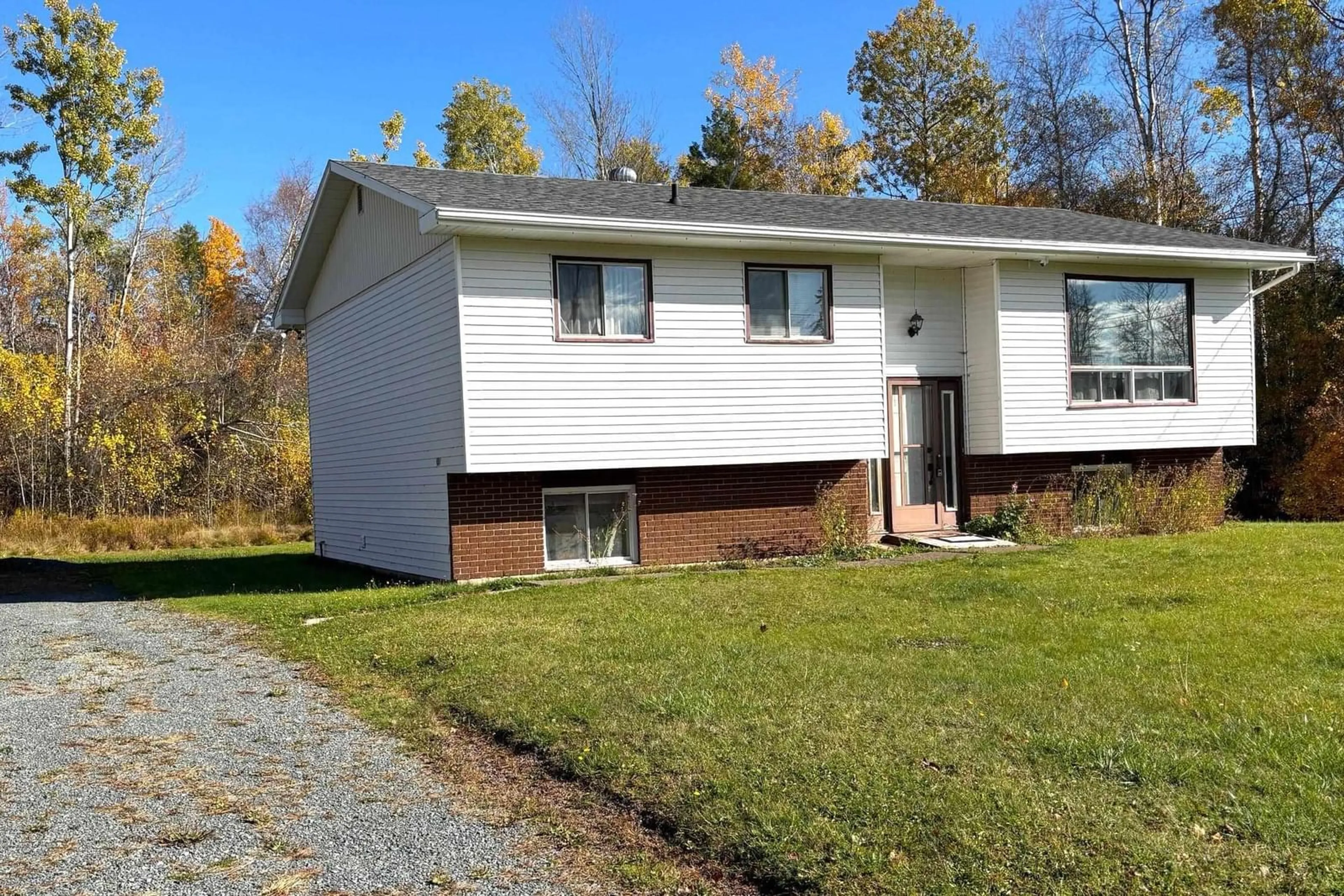 Home with vinyl exterior material, street for 1194 Alma Rd, Loch Broom Nova Scotia B0K 2A0