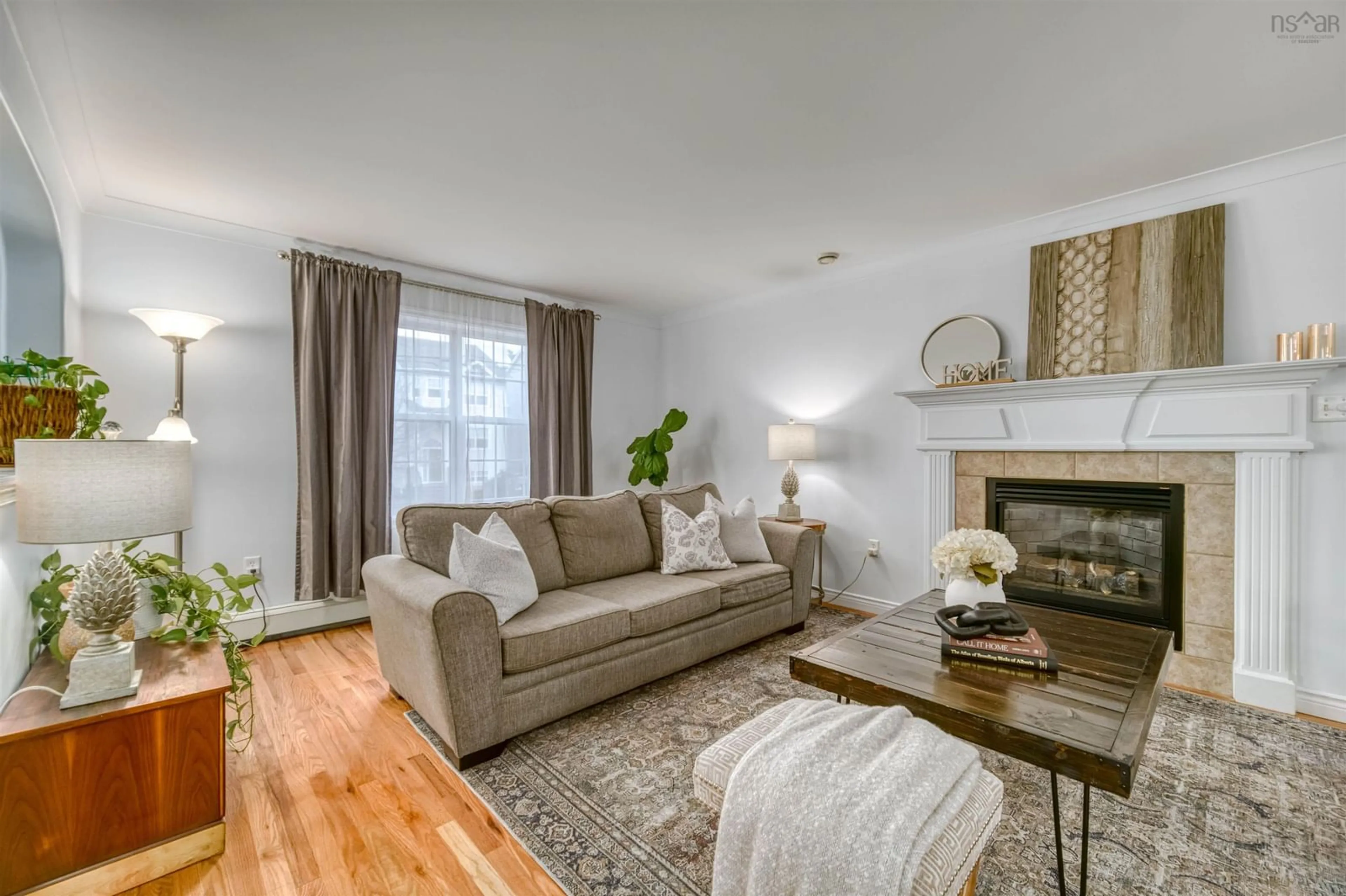 Living room with furniture, wood/laminate floor for 208 Oceanview Dr, Bedford Nova Scotia B4A 4G9