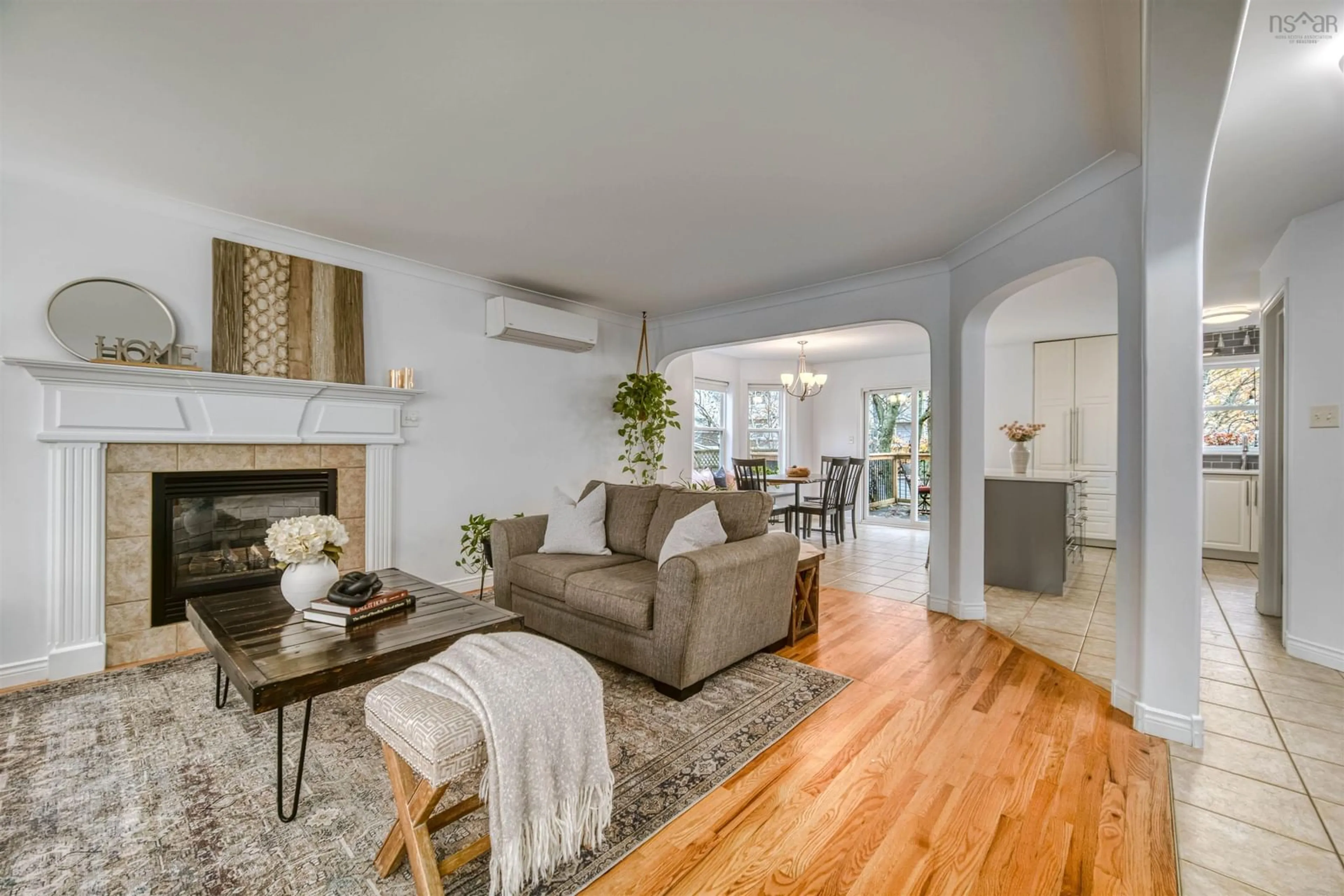 Living room with furniture, wood/laminate floor for 208 Oceanview Dr, Bedford Nova Scotia B4A 4G9