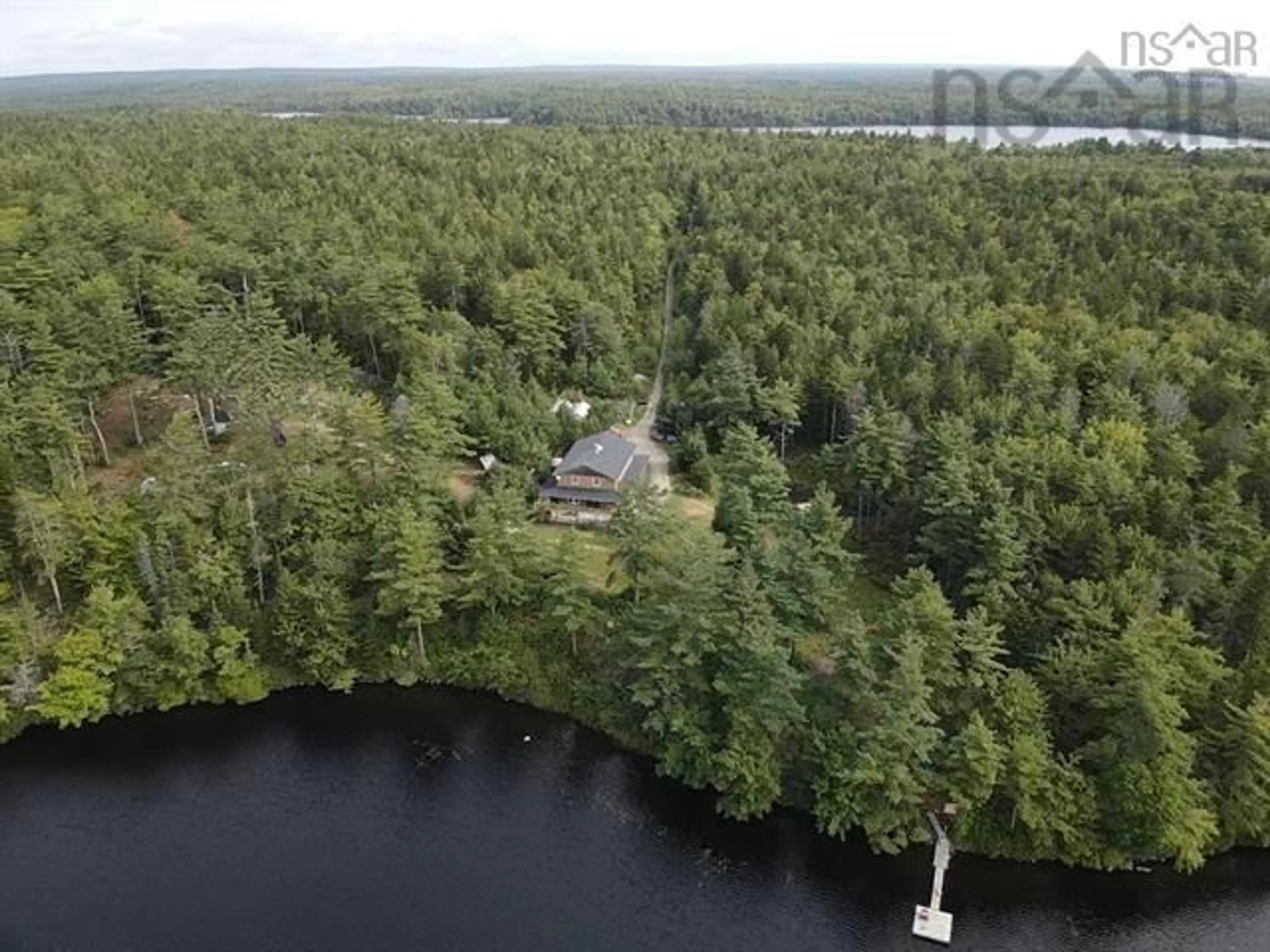 A pic from outside/outdoor area/front of a property/back of a property/a pic from drone, water/lake/river/ocean view for 236 Canoe Lake Estates Rd, East Quinan Nova Scotia B0W 2M0