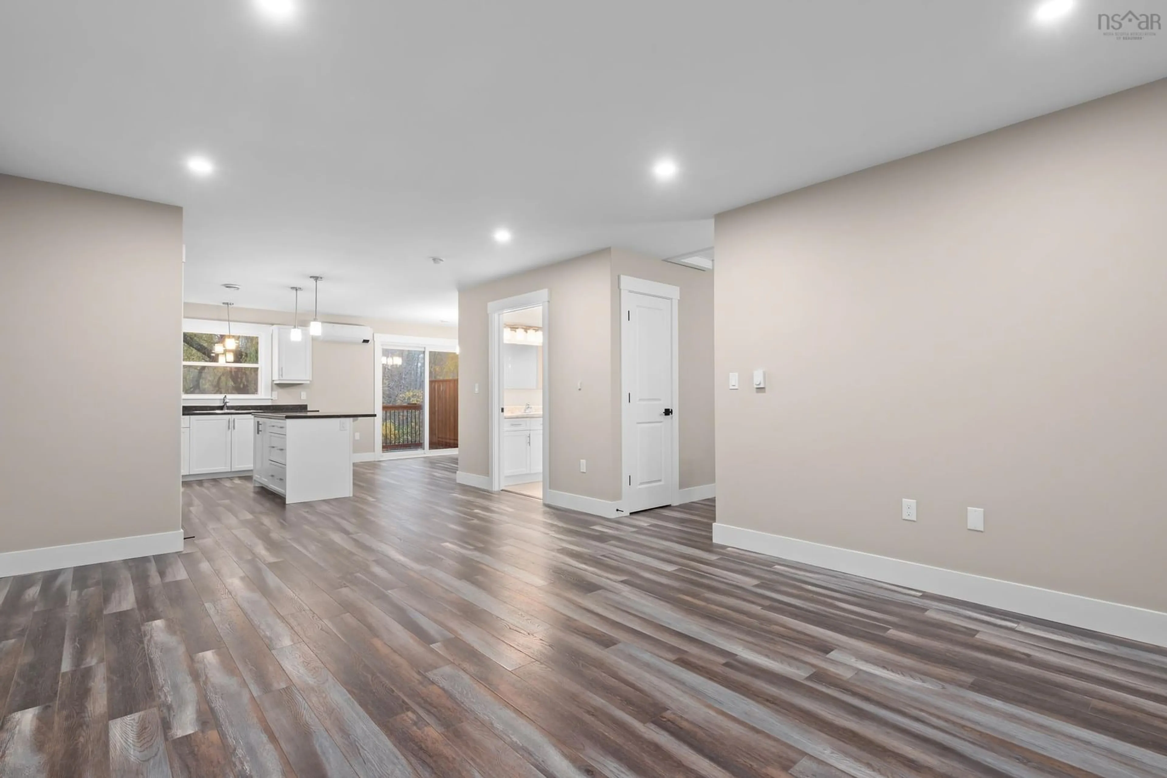 Open concept kitchen, wood/laminate floor for 1438 Hwy 2, Lantz Ns, Lantz Nova Scotia B2S 1Z8