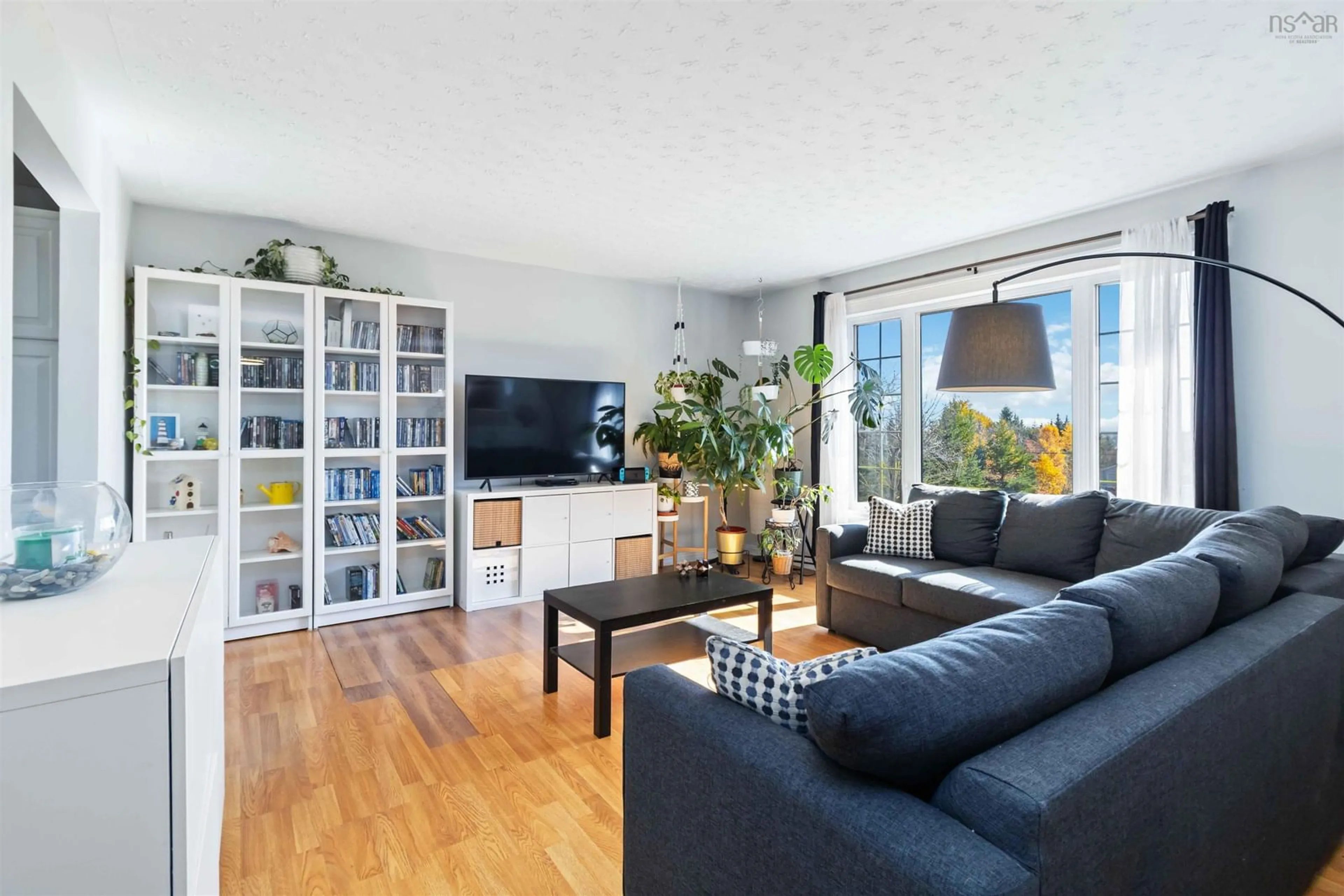 Living room with furniture, wood/laminate floor for 9 Colony Way, Lawrencetown Nova Scotia B2Z 1R4