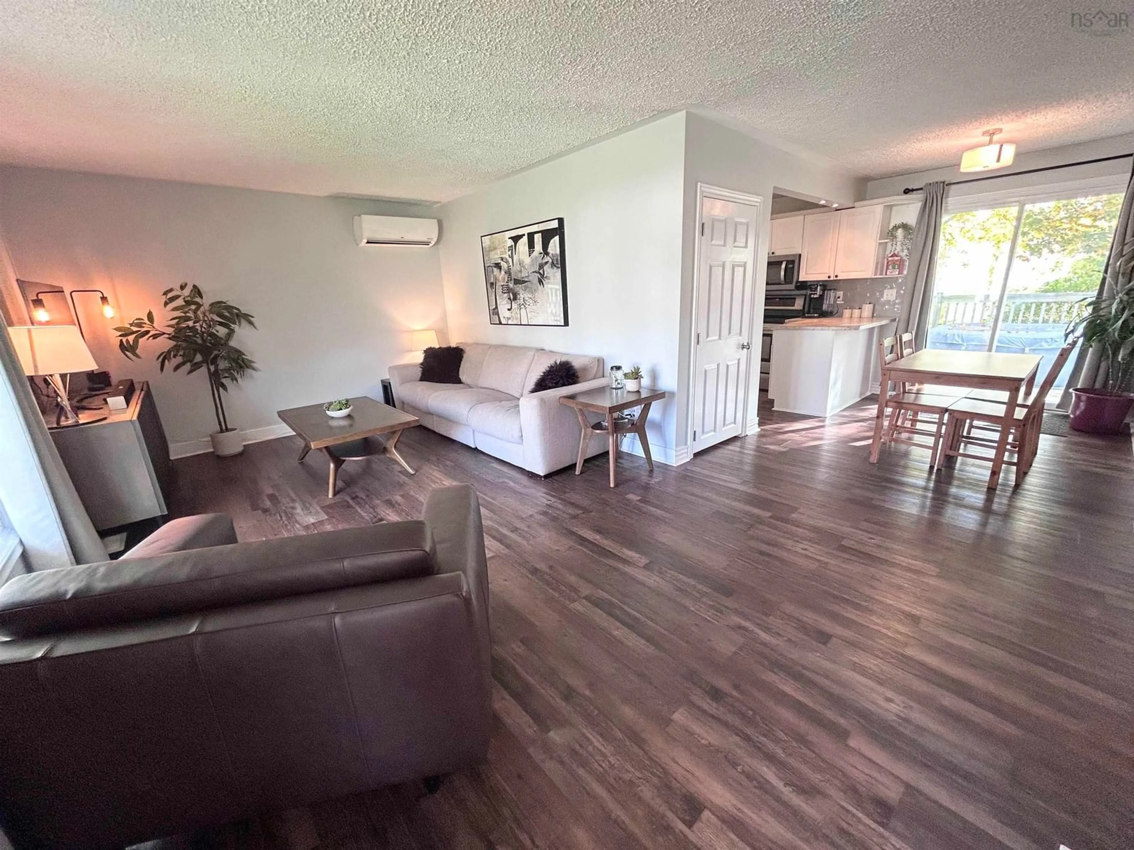 Living room with furniture, wood/laminate floor for 32 Lawson Ave, Dartmouth Nova Scotia B2W 2Z3