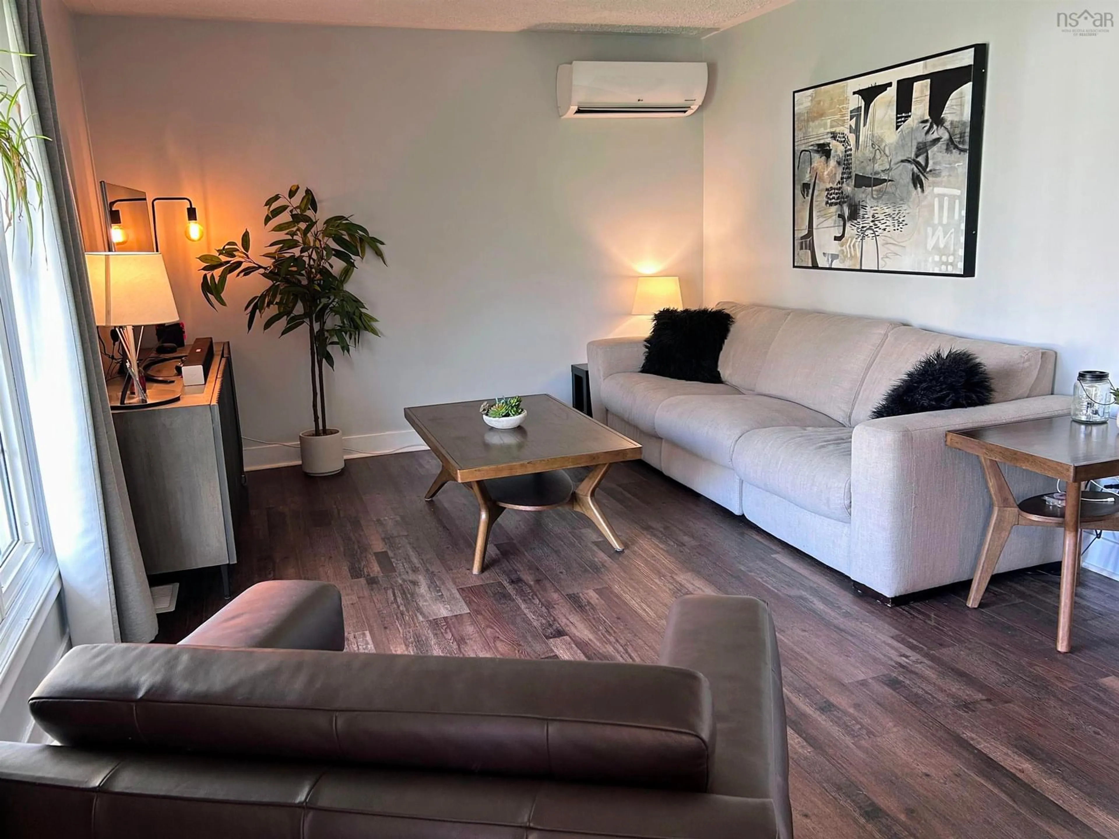 Living room with furniture, wood/laminate floor for 32 Lawson Ave, Dartmouth Nova Scotia B2W 2Z3