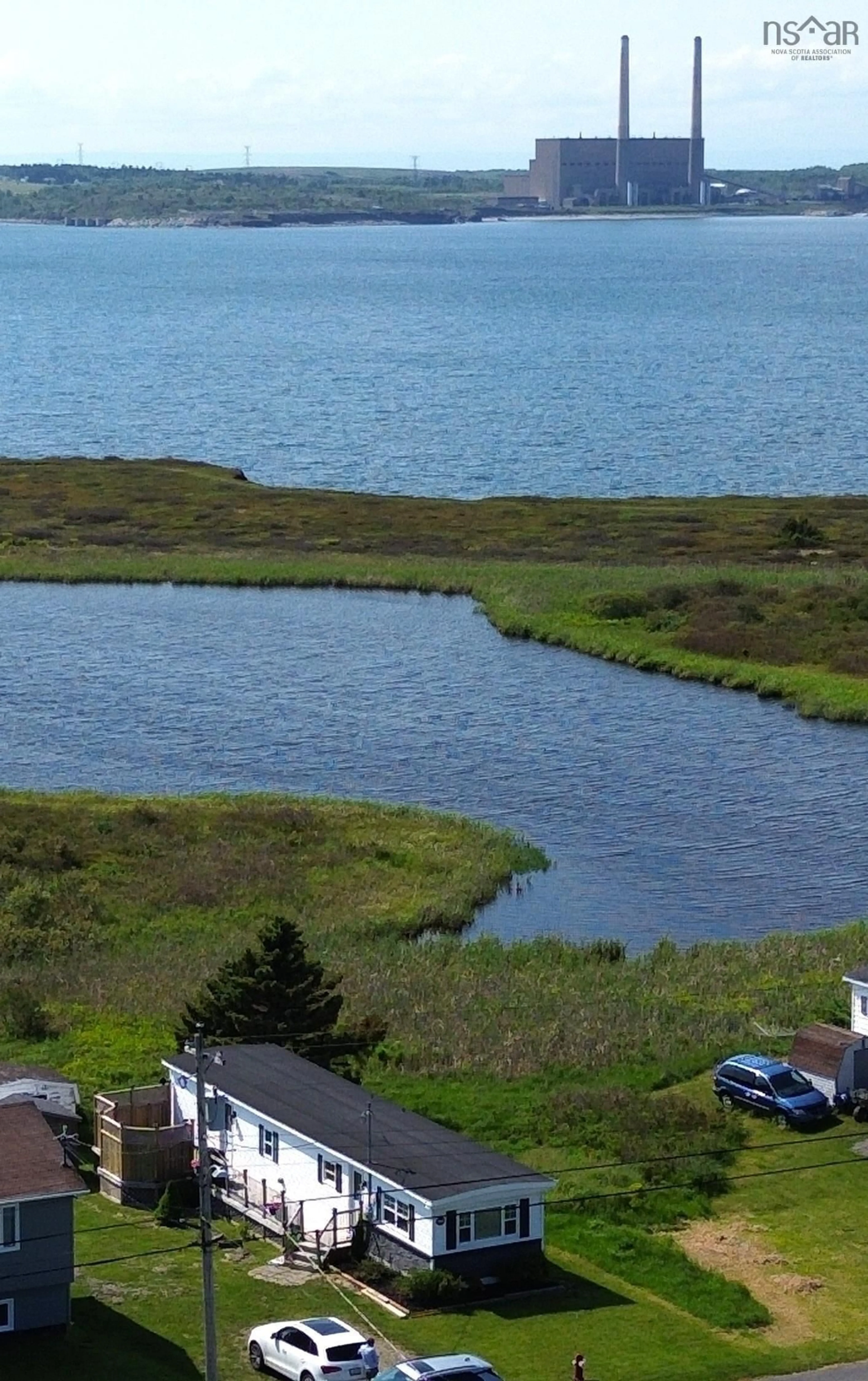 A pic from outside/outdoor area/front of a property/back of a property/a pic from drone, water/lake/river/ocean view for 127 Park St, Dominion Nova Scotia B1G 1R7