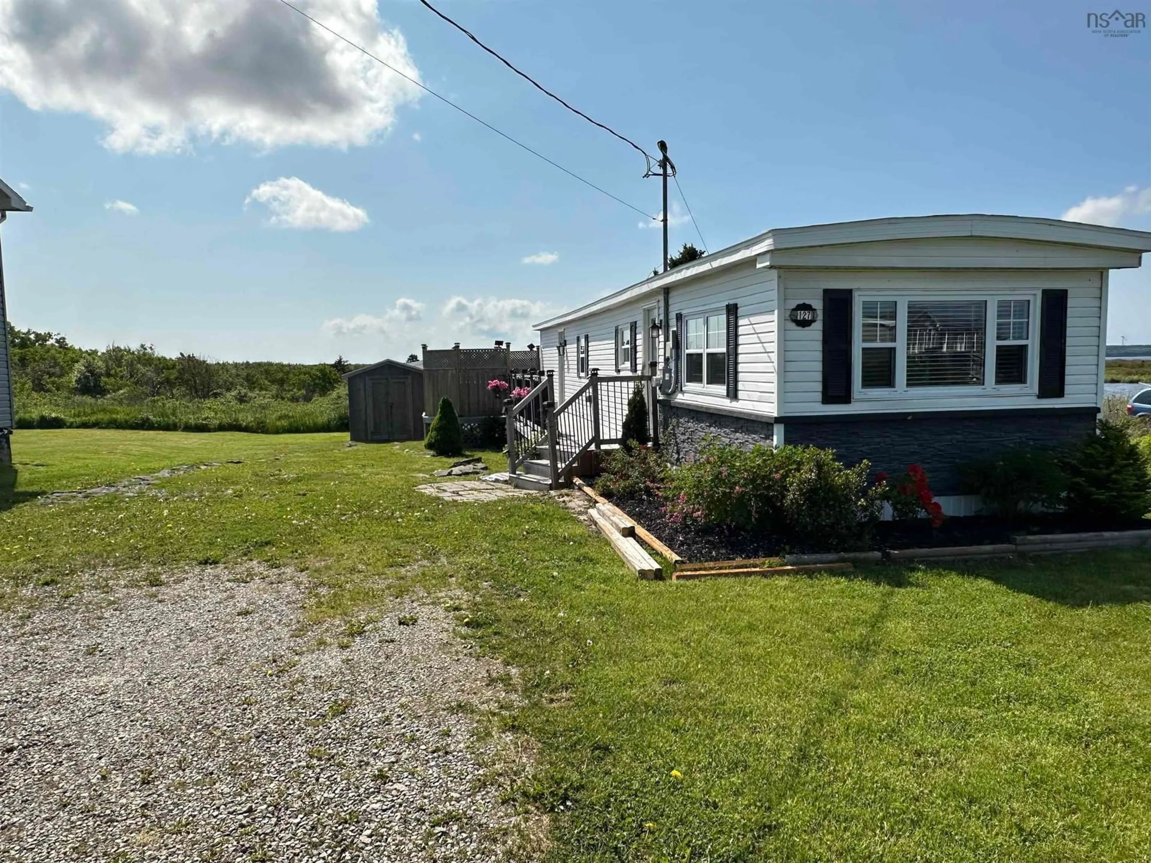 A pic from outside/outdoor area/front of a property/back of a property/a pic from drone, water/lake/river/ocean view for 127 Park St, Dominion Nova Scotia B1G 1R7