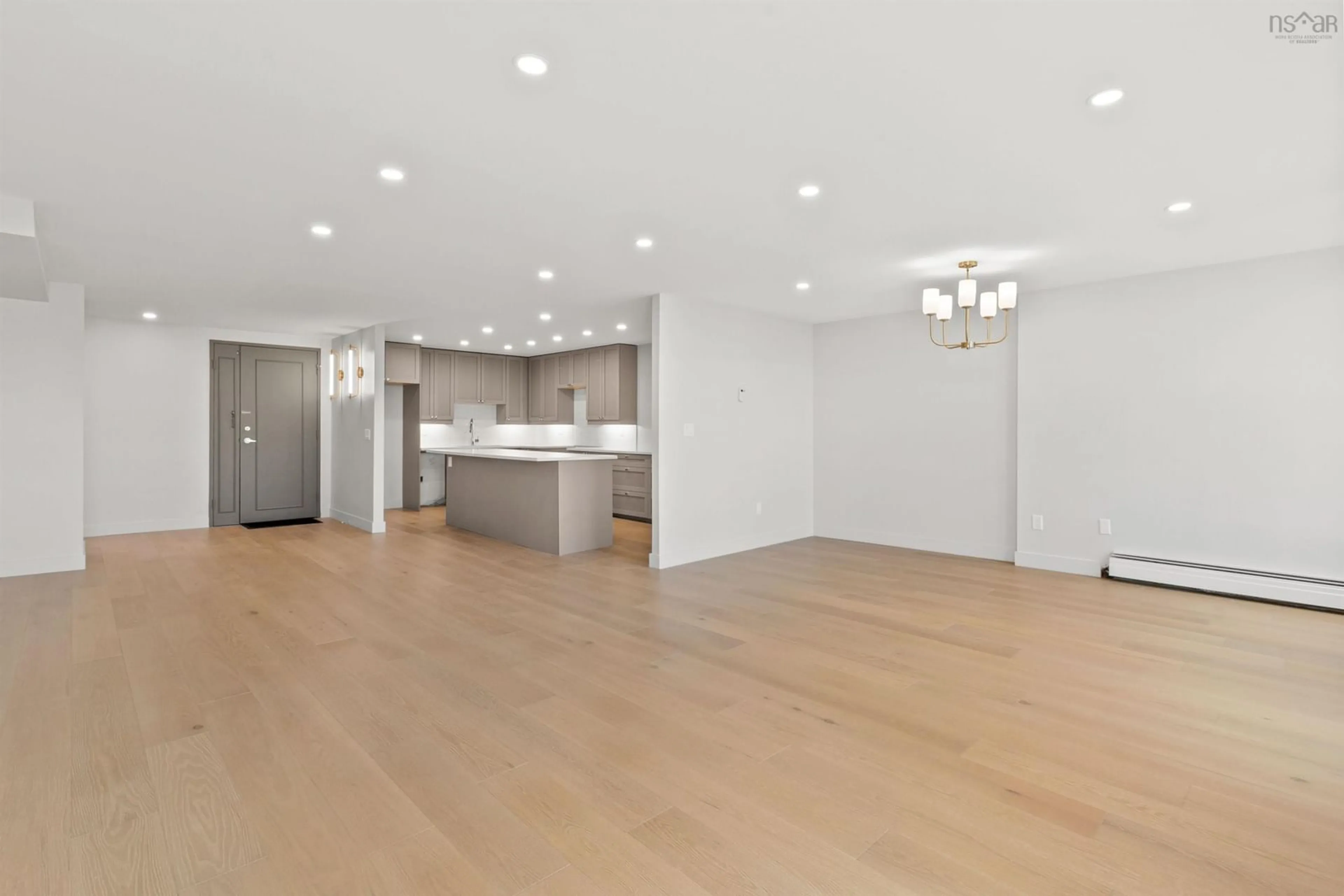 Open concept kitchen, wood/laminate floor for 6369 Coburg Rd #406, Halifax Nova Scotia B3H 4J7