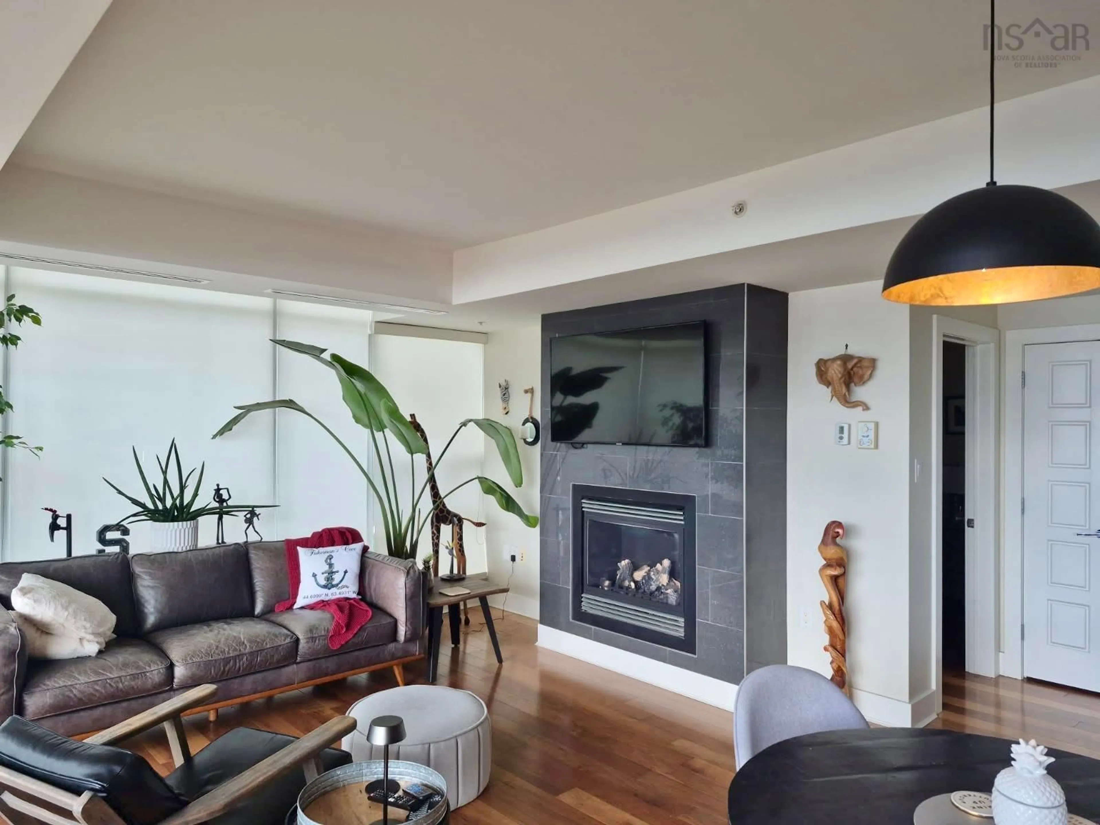 Living room with furniture, wood/laminate floor for 31 Kings Wharf Pl #706, Dartmouth Nova Scotia B2Y 0C1