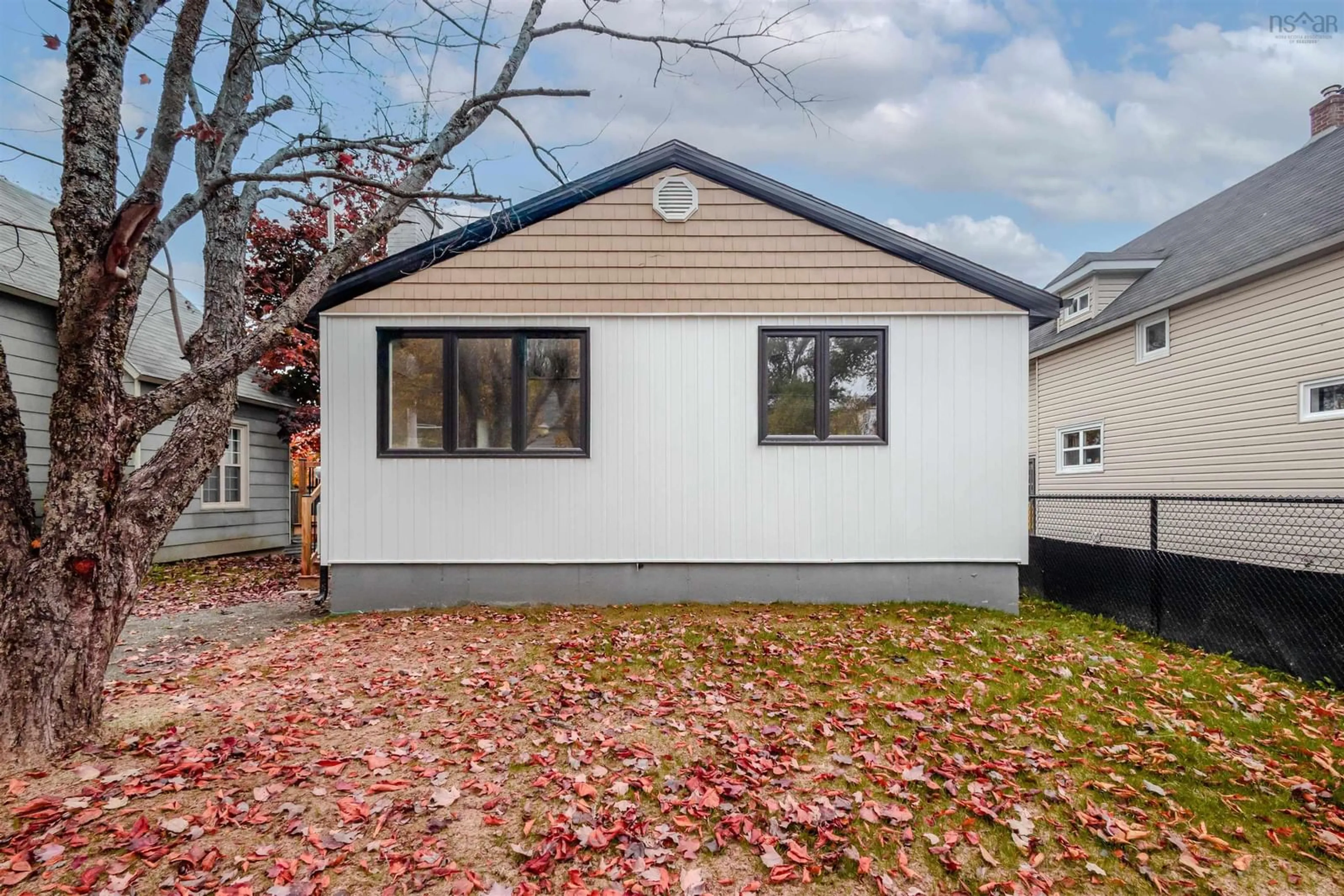 Home with vinyl exterior material, street for 19 Louisa St, Sydney Nova Scotia B1P 6E9