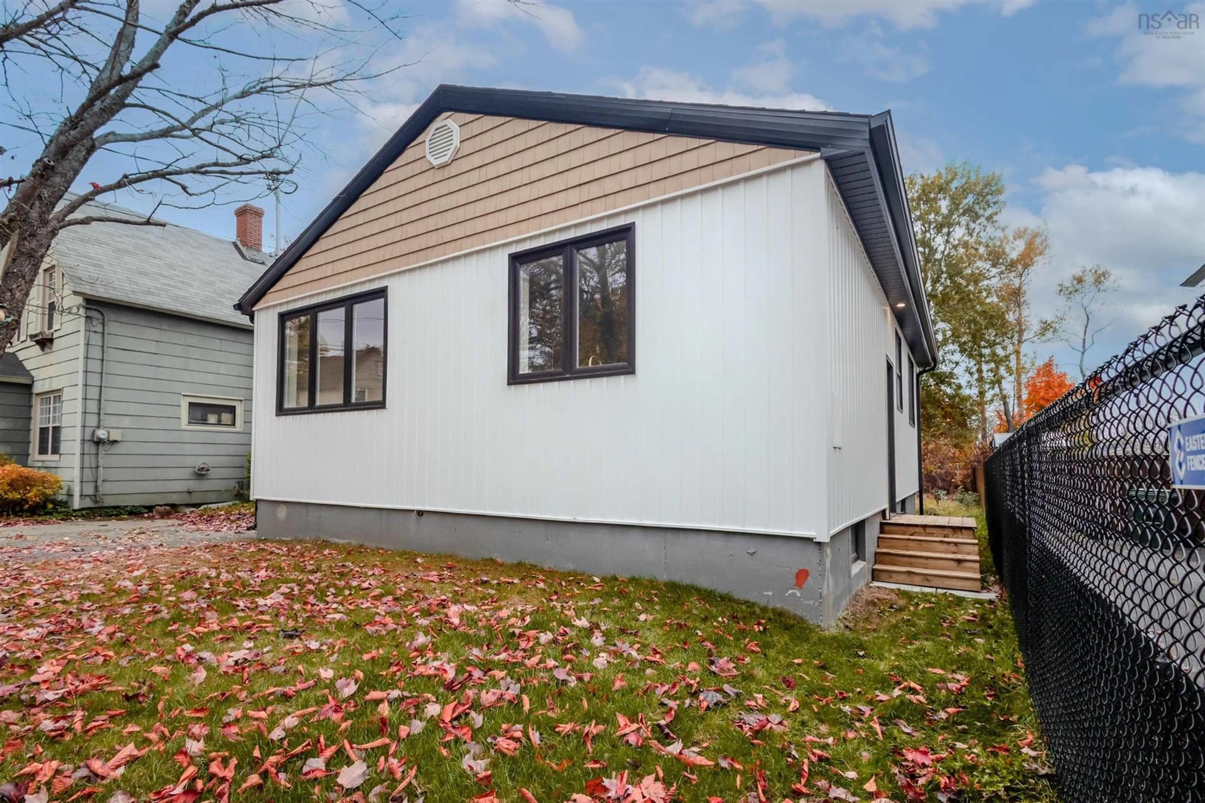 Home with vinyl exterior material, street for 19 Louisa St, Sydney Nova Scotia B1P 6E9