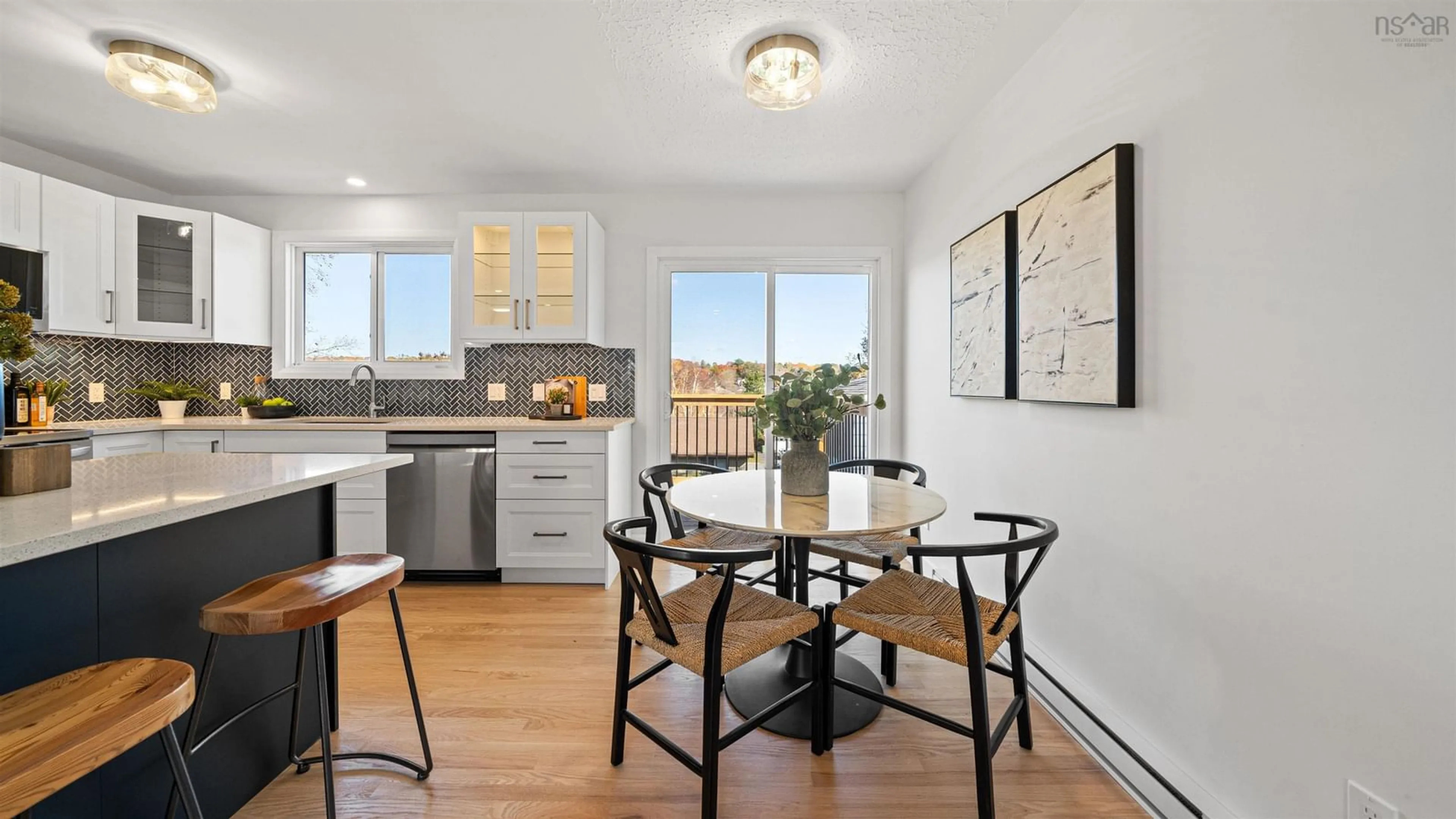 Open concept kitchen, wood/laminate floor for 455 Old Sackville Rd, Sackville Nova Scotia B4C 2K1