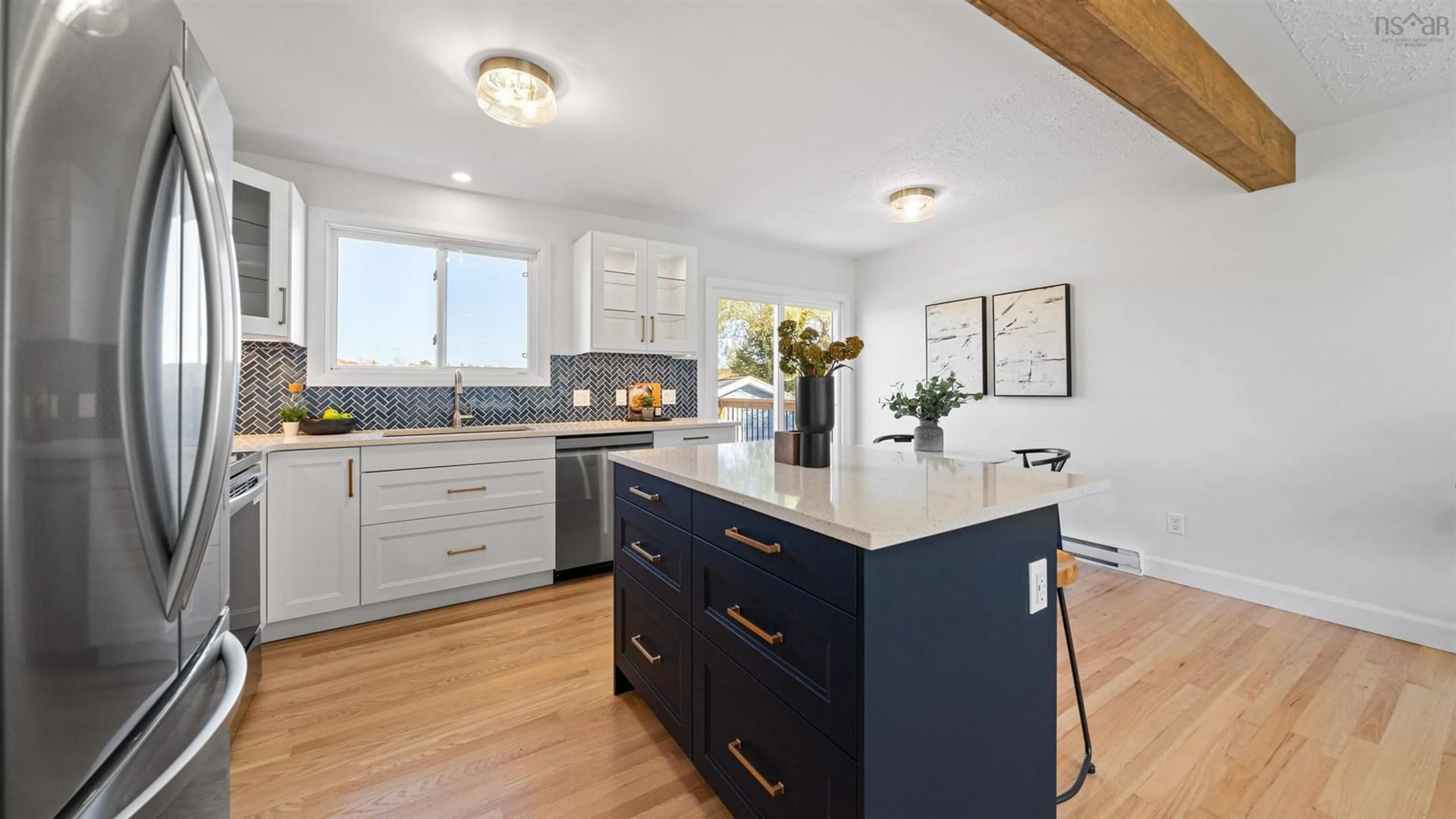 Open concept kitchen, wood/laminate floor for 455 Old Sackville Rd, Sackville Nova Scotia B4C 2K1