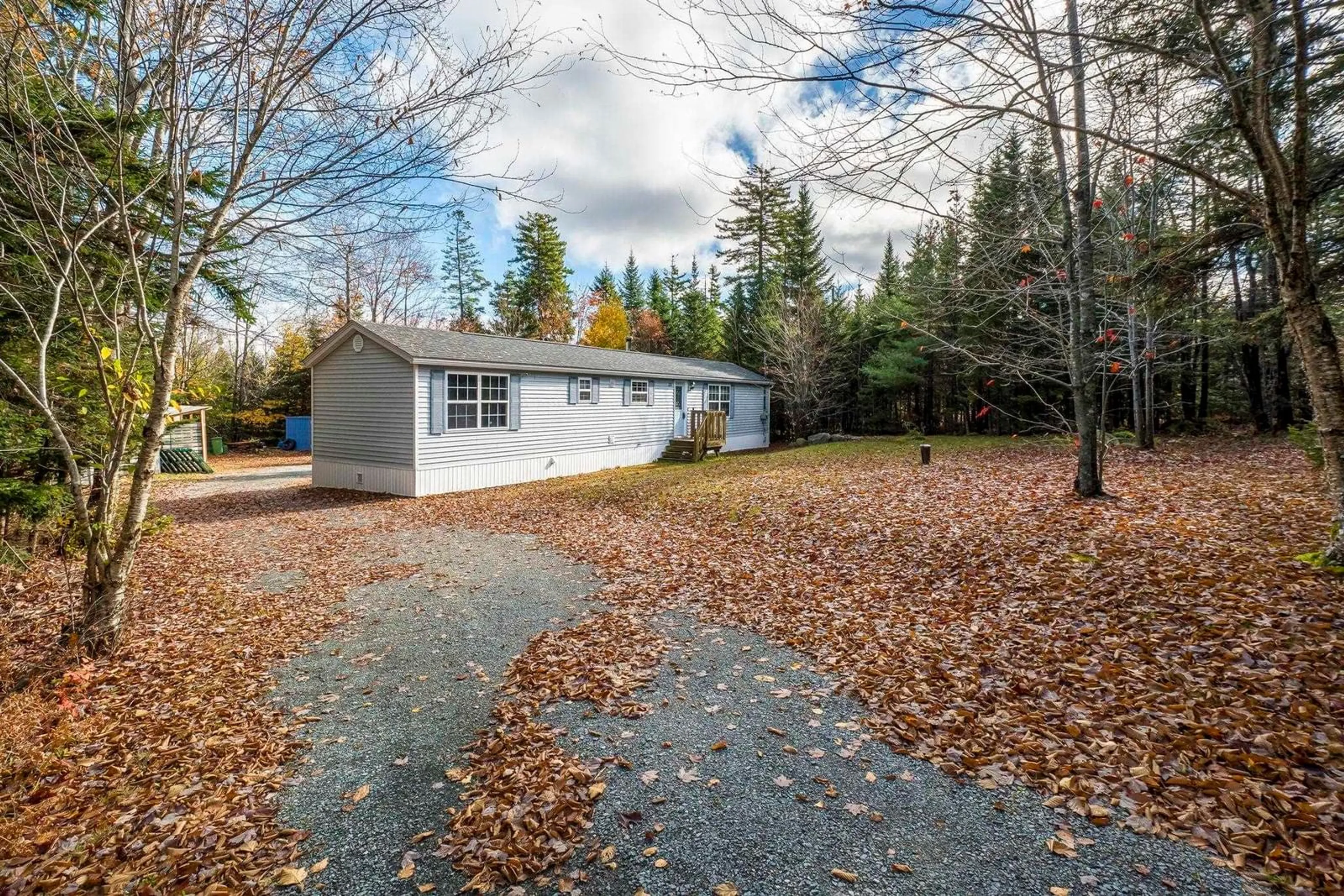 A pic from outside/outdoor area/front of a property/back of a property/a pic from drone, street for 319 Myra Rd, Porters Lake Nova Scotia B3E 1G2