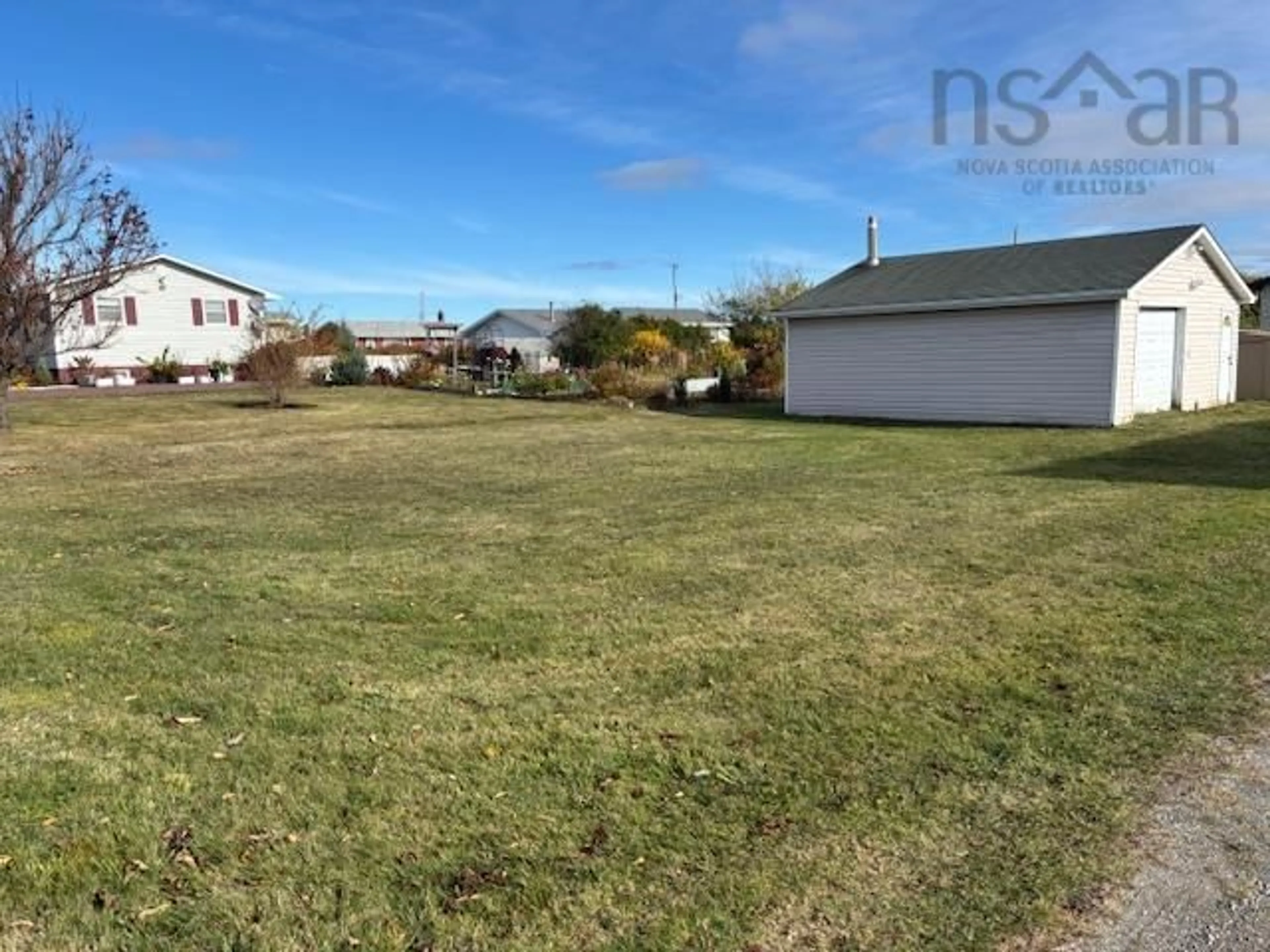 A pic from outside/outdoor area/front of a property/back of a property/a pic from drone, water/lake/river/ocean view for 256 Ling St, New Waterford Nova Scotia B1H 2W4