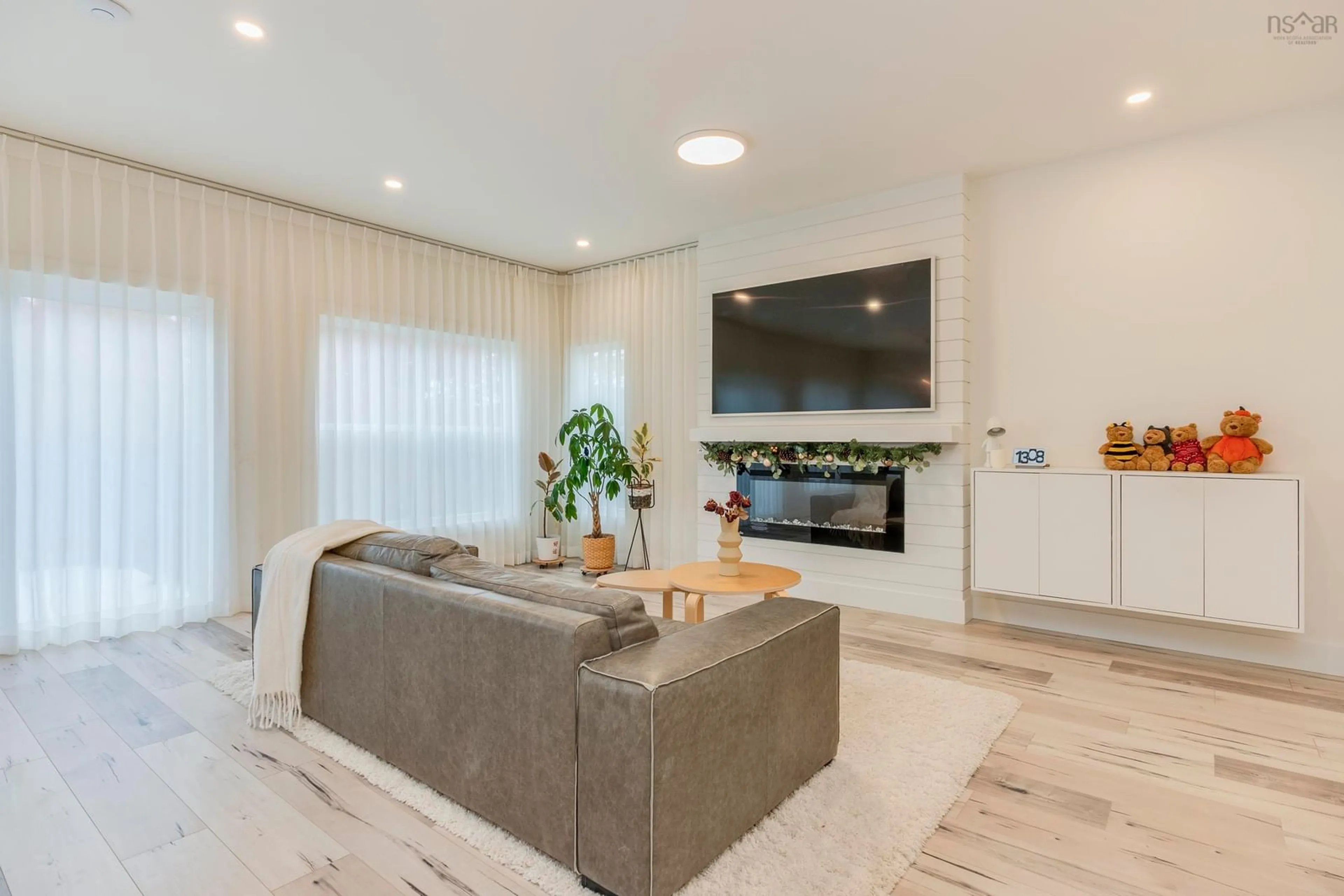 Living room with furniture, ceramic/tile floor for 67 Talus St, Bedford Nova Scotia B4B 1T9