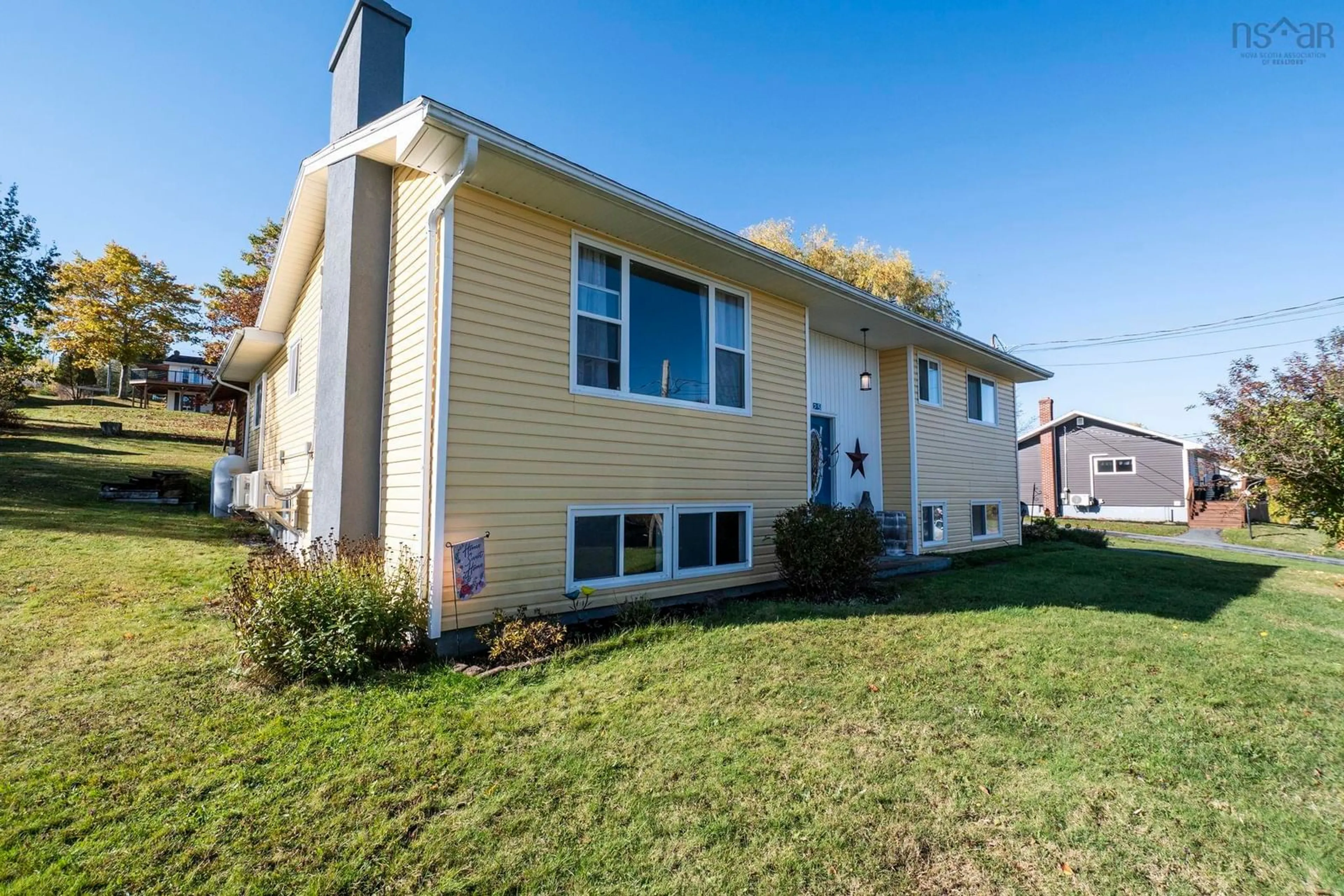 Home with vinyl exterior material, street for 25 Maple Ave, Hantsport Nova Scotia B0P 1P0