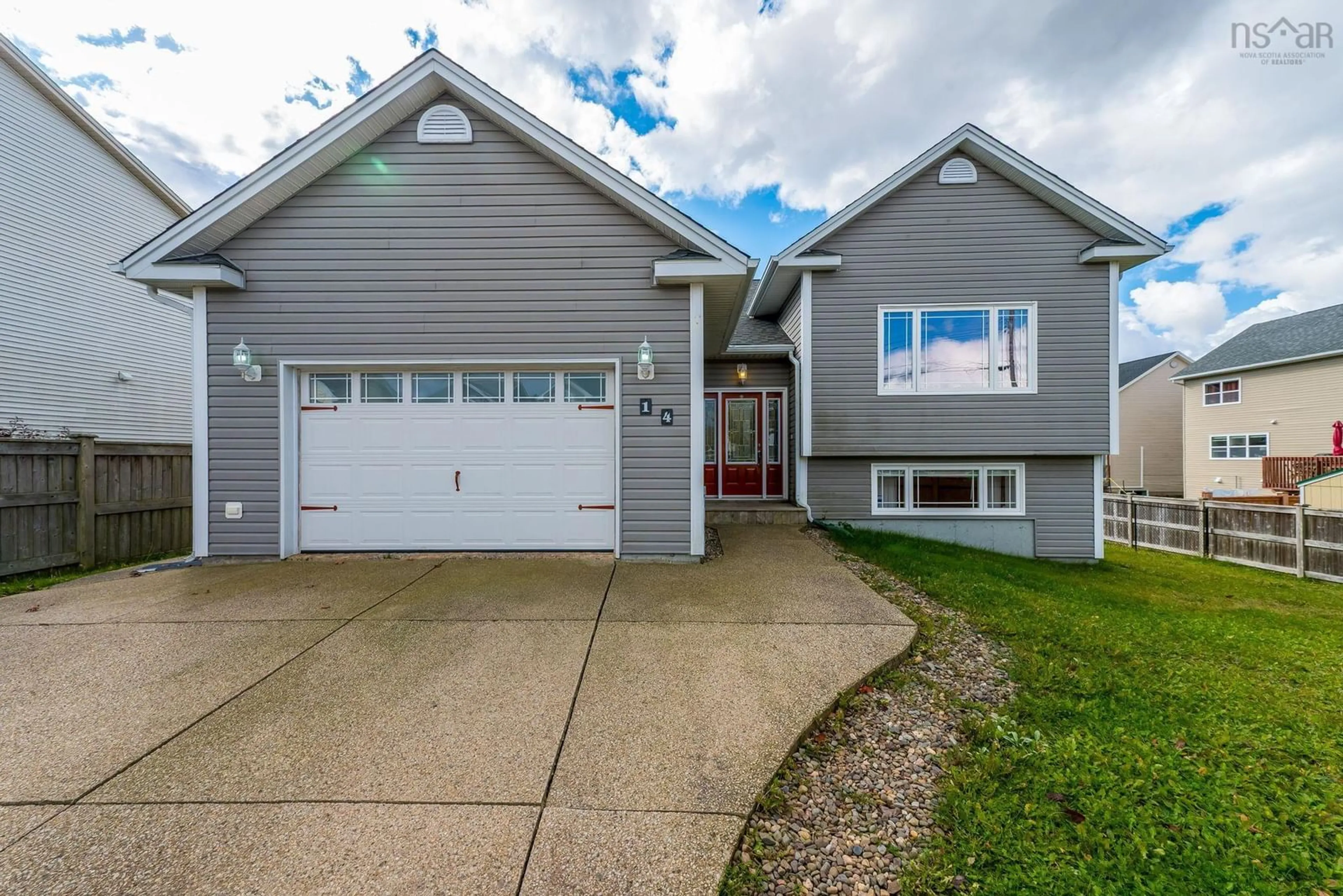 Home with vinyl exterior material, street for 14 Marshall St, Dartmouth Nova Scotia B2X 0A8