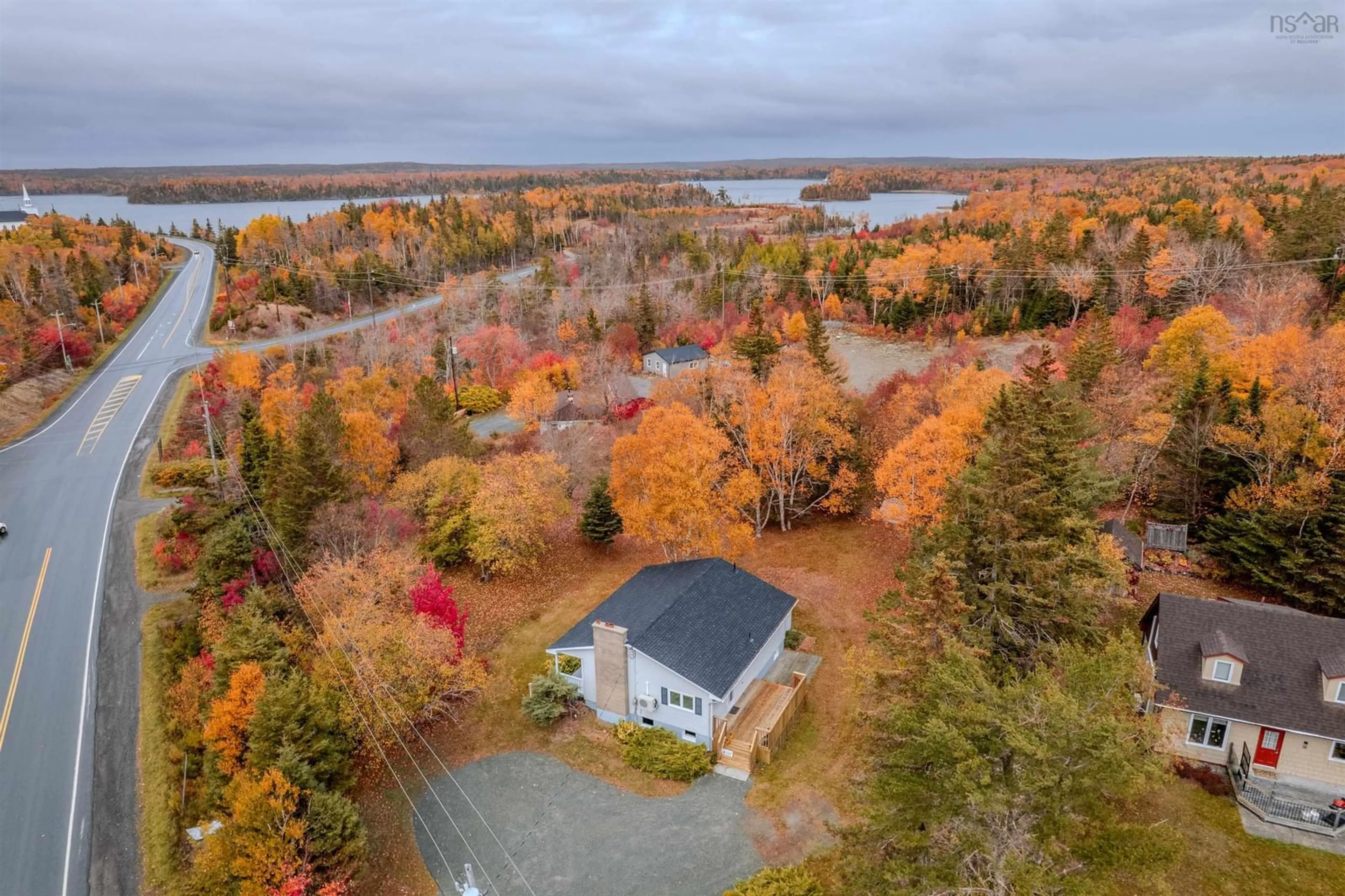 A pic from outside/outdoor area/front of a property/back of a property/a pic from drone, water/lake/river/ocean view for 4327 Louisbourg Hwy, Albert Bridge Nova Scotia B1K 2P4
