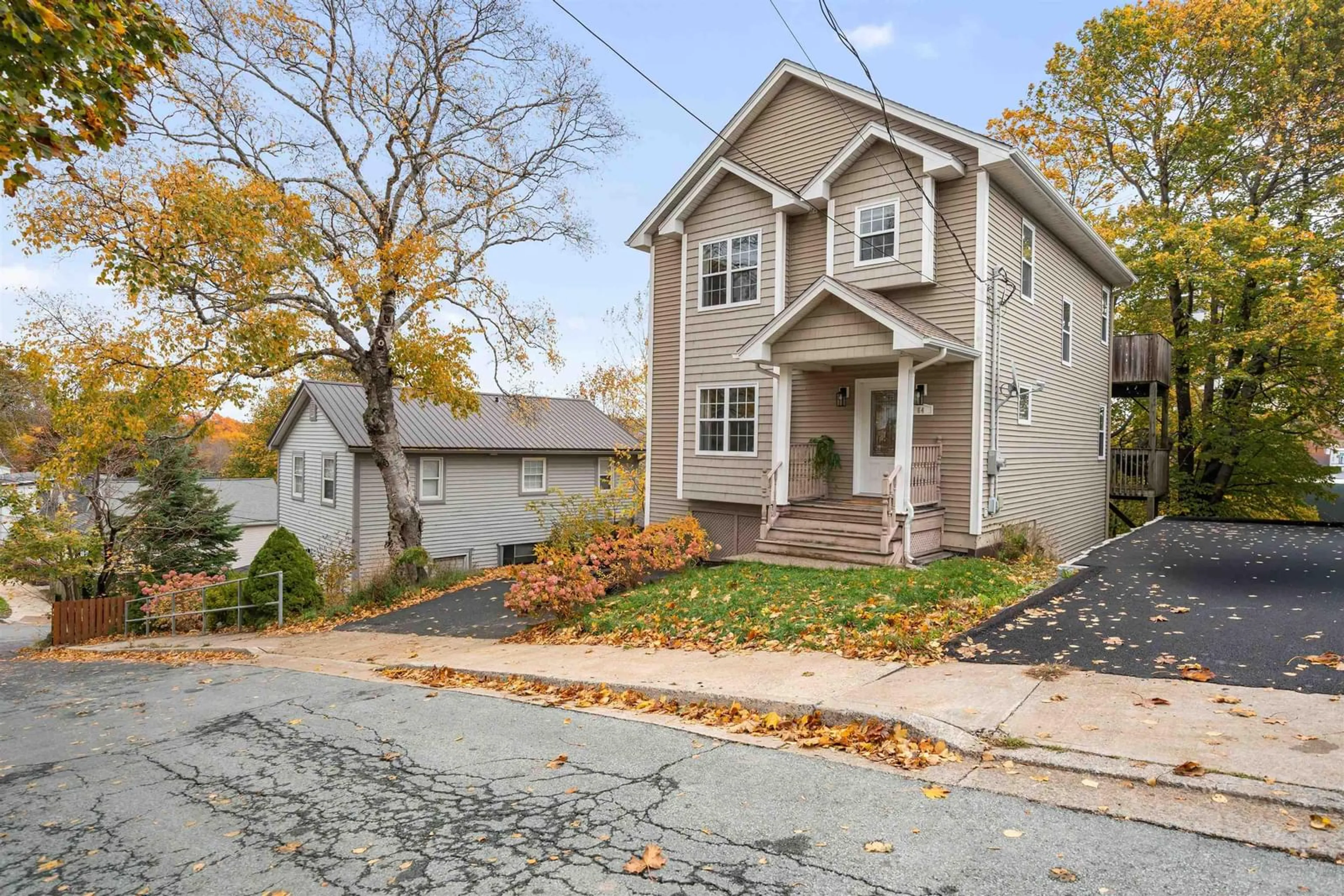 Home with vinyl exterior material, street for 64 Rose St, Dartmouth Nova Scotia B3A 2T9
