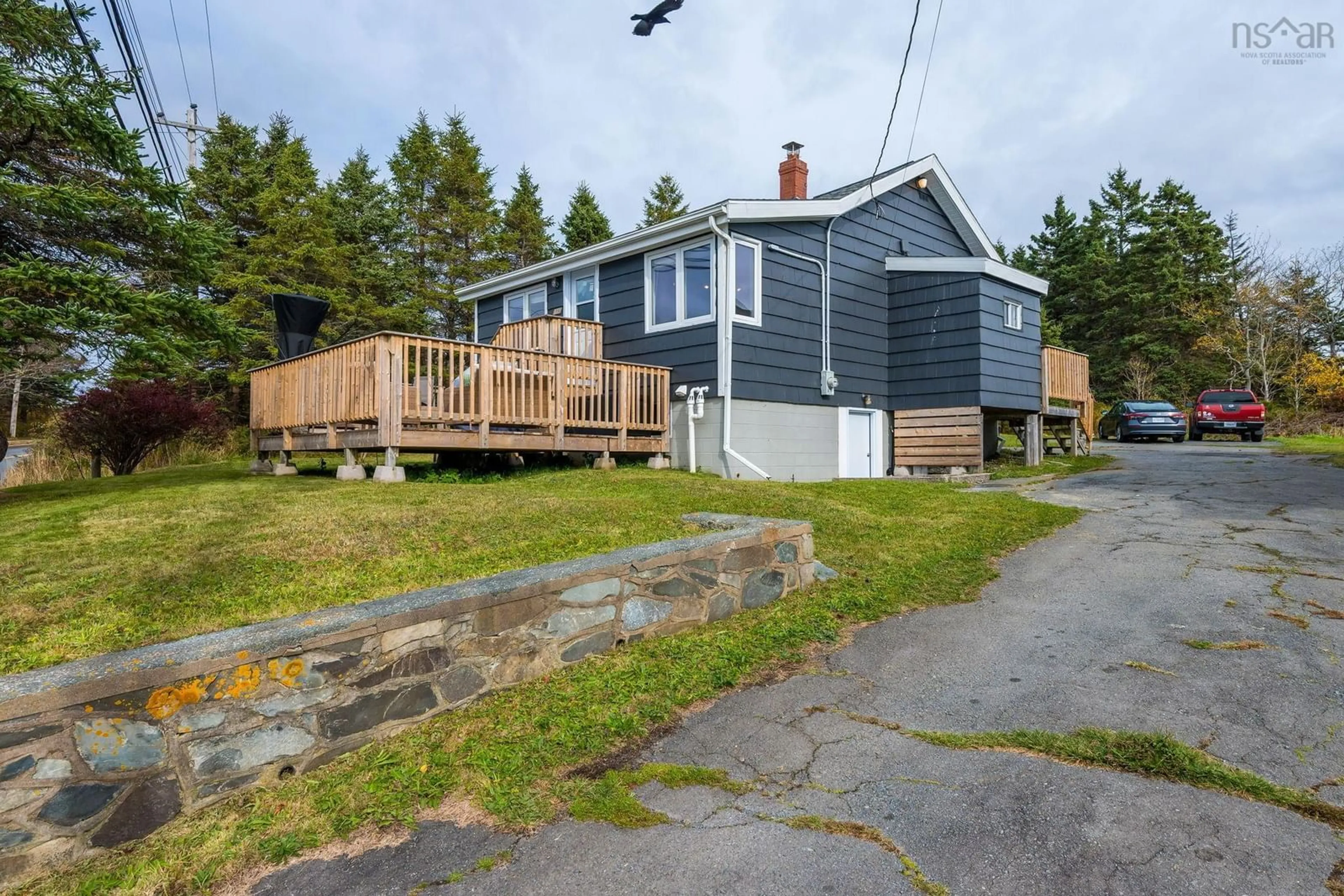 A pic from outside/outdoor area/front of a property/back of a property/a pic from drone, street for 1990 Caldwell Rd, Eastern Passage Nova Scotia B3G 1H9