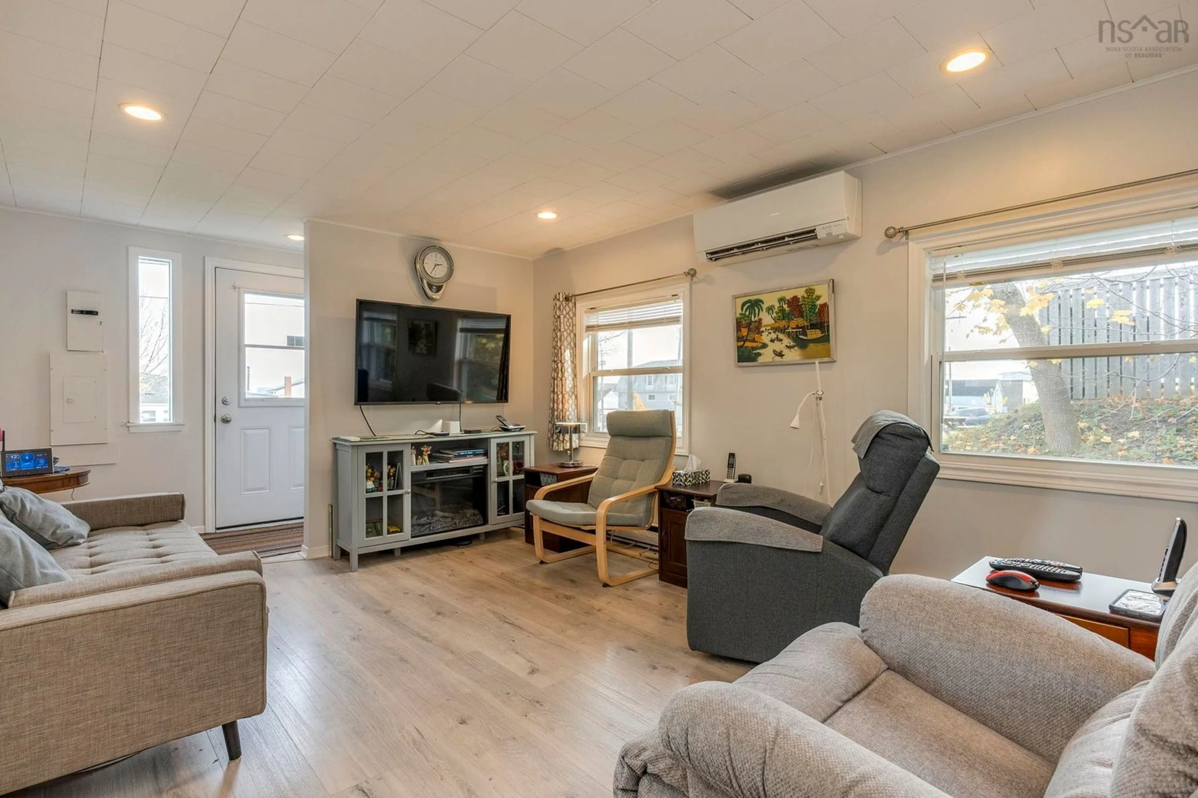 Living room with furniture, wood/laminate floor for 155 First Ave, Digby Nova Scotia B0N 1A0