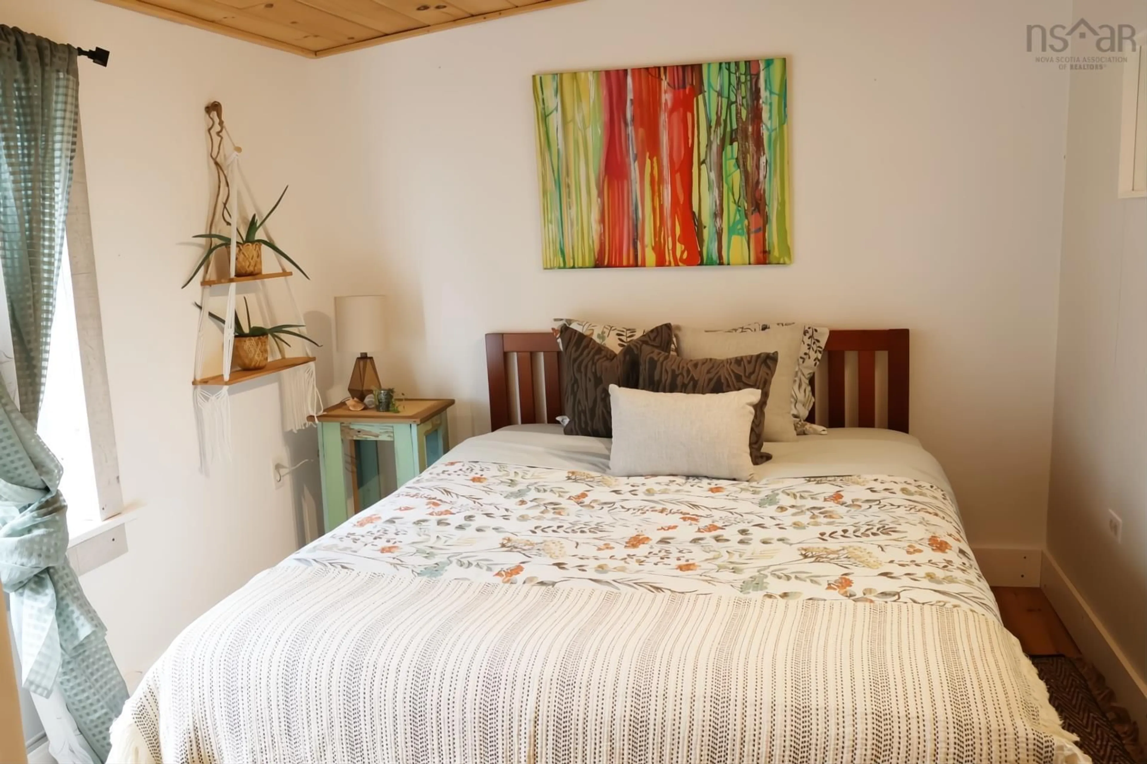 Bedroom with bed, wood/laminate floor for 8848 St Margarets Bay Rd, Queensland Nova Scotia B0J 1T0