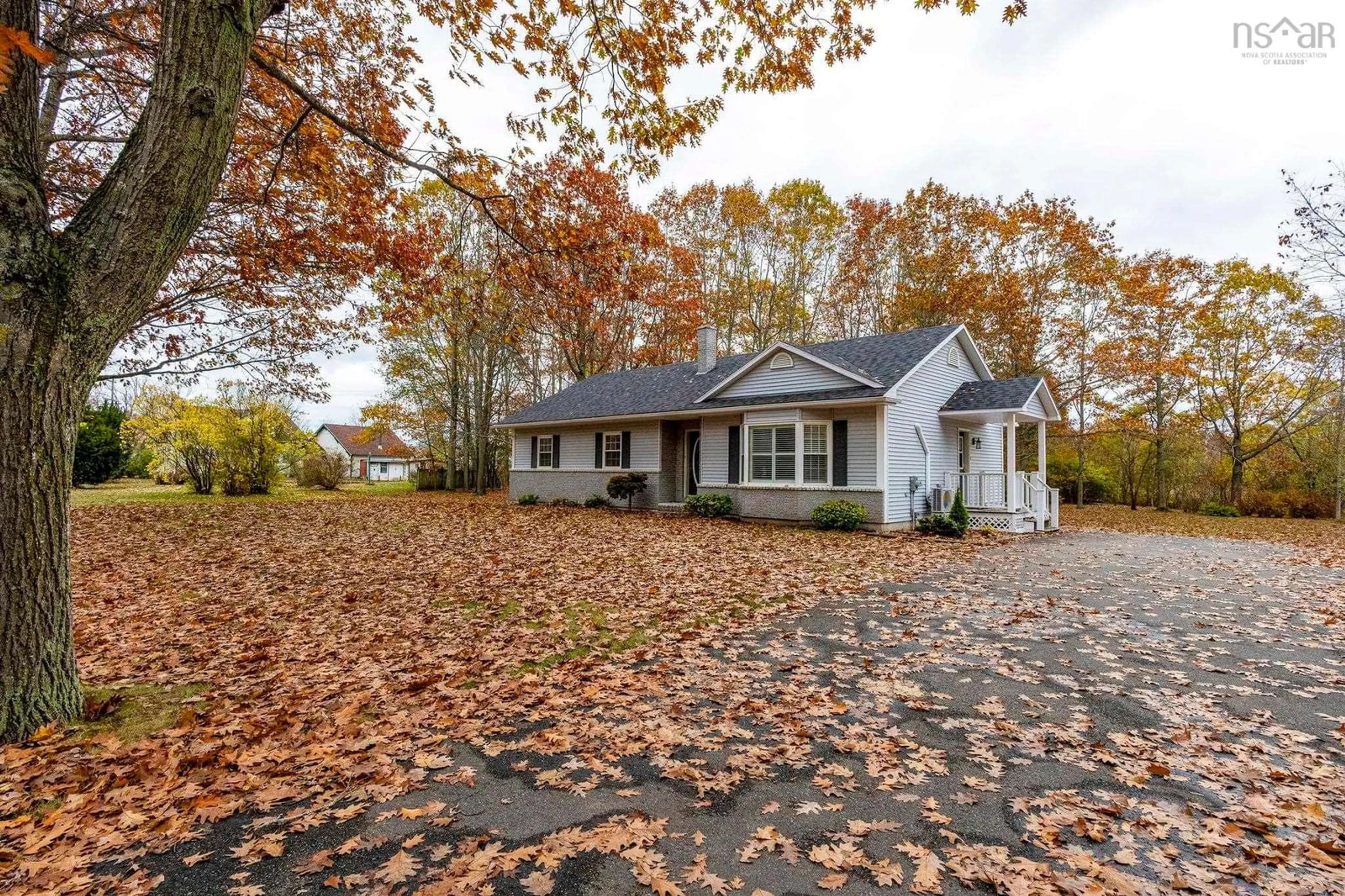 Home with vinyl exterior material, street for 1224 Maple St, Waterville Nova Scotia B0P 1V0