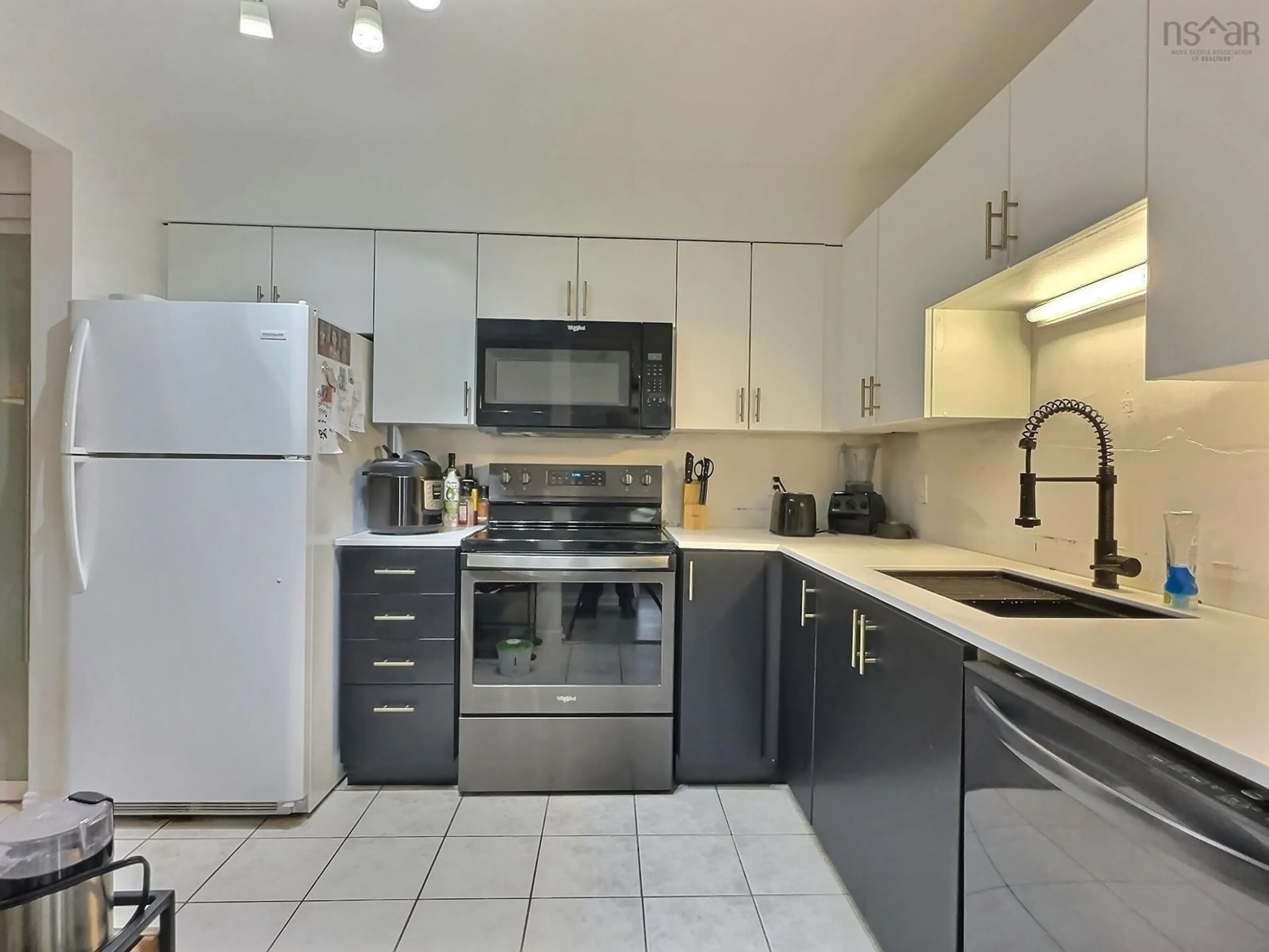 Standard kitchen, ceramic/tile floor for 83 Kearney Lake Rd #301, Halifax Nova Scotia B3M 4E6