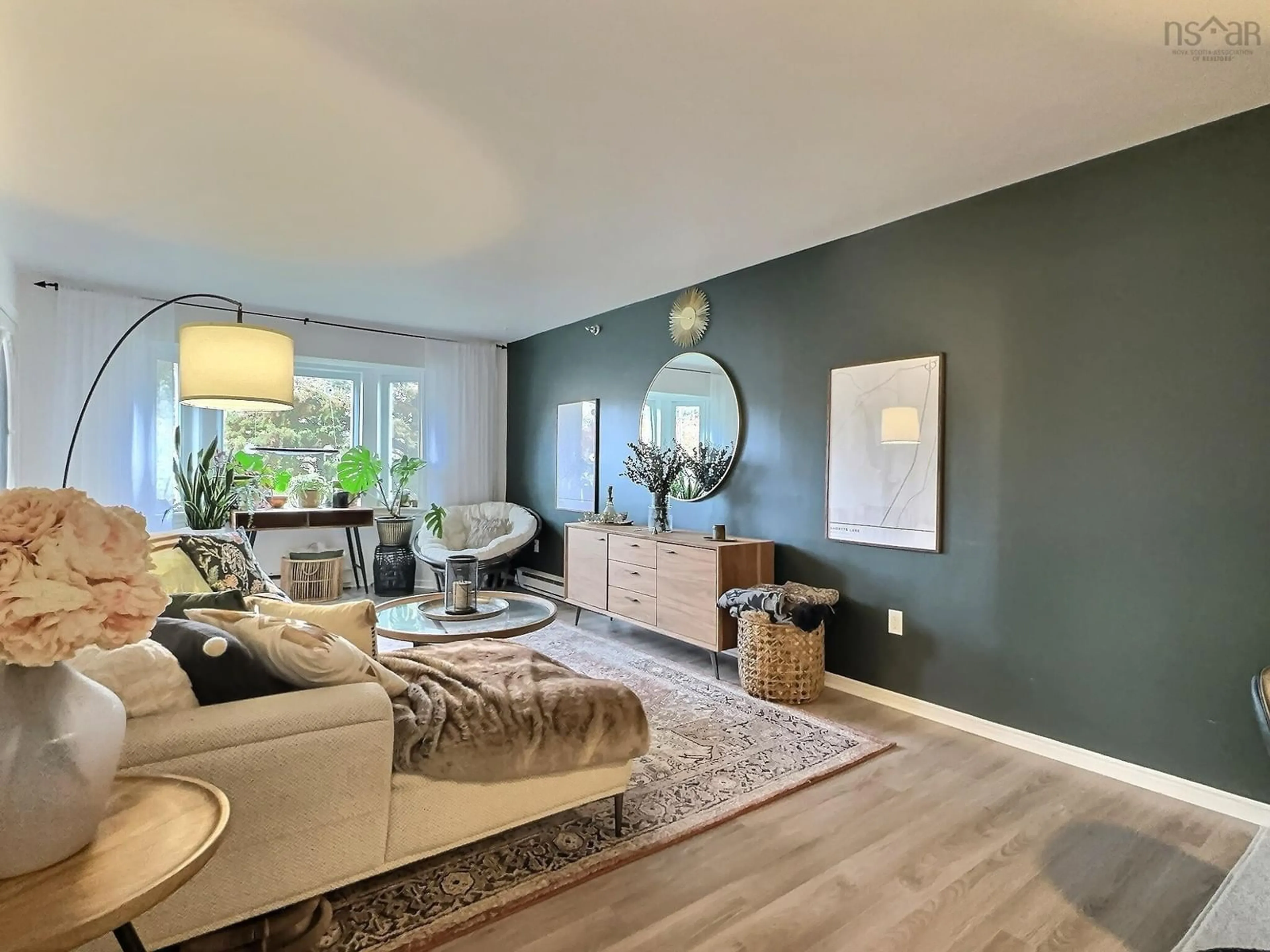 Living room with furniture, wood/laminate floor for 83 Kearney Lake Rd #301, Halifax Nova Scotia B3M 4E6