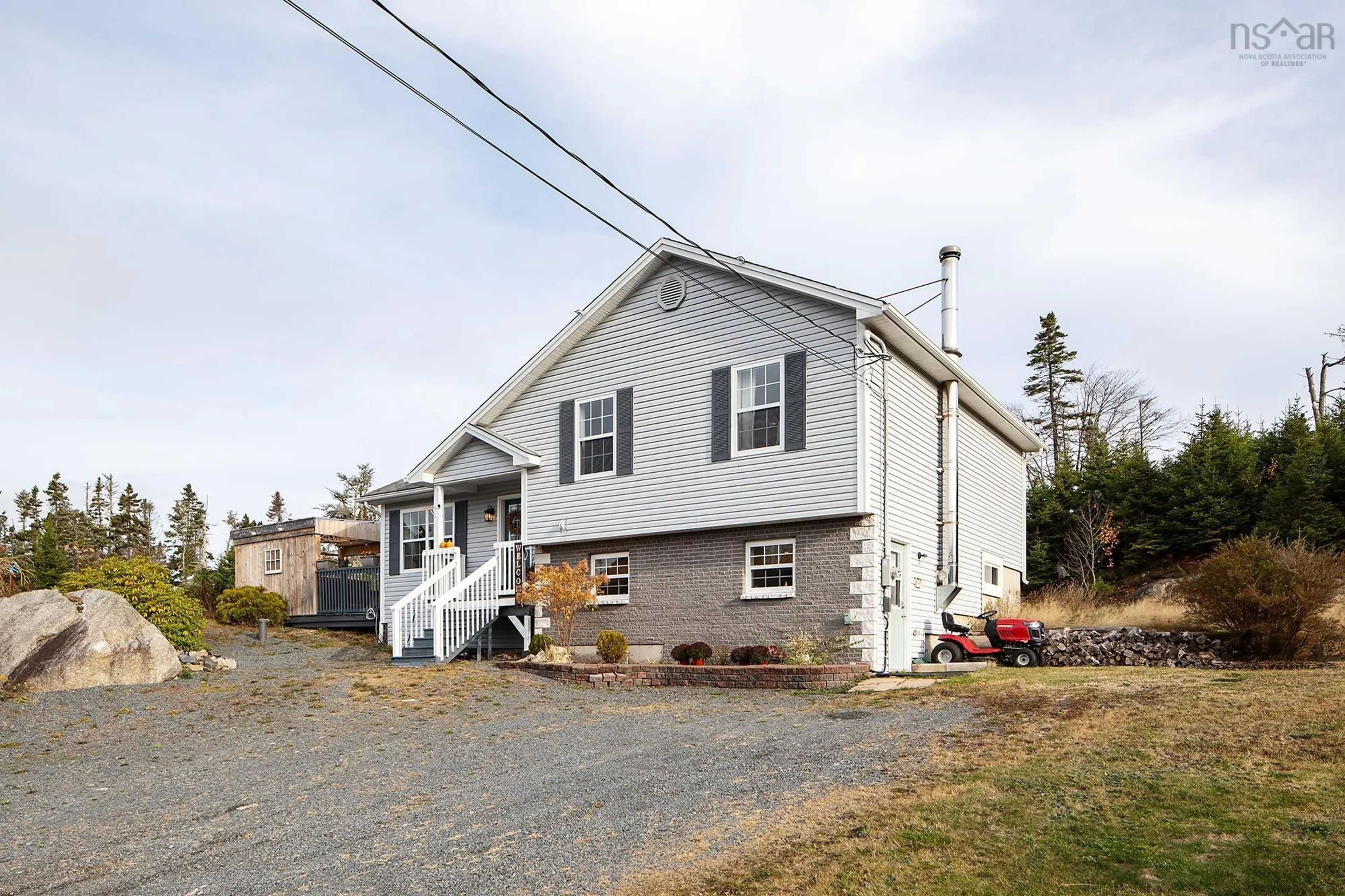 A pic from outside/outdoor area/front of a property/back of a property/a pic from drone, street for 126 Middle Village Rd, West Dover Nova Scotia B3Z 3T3