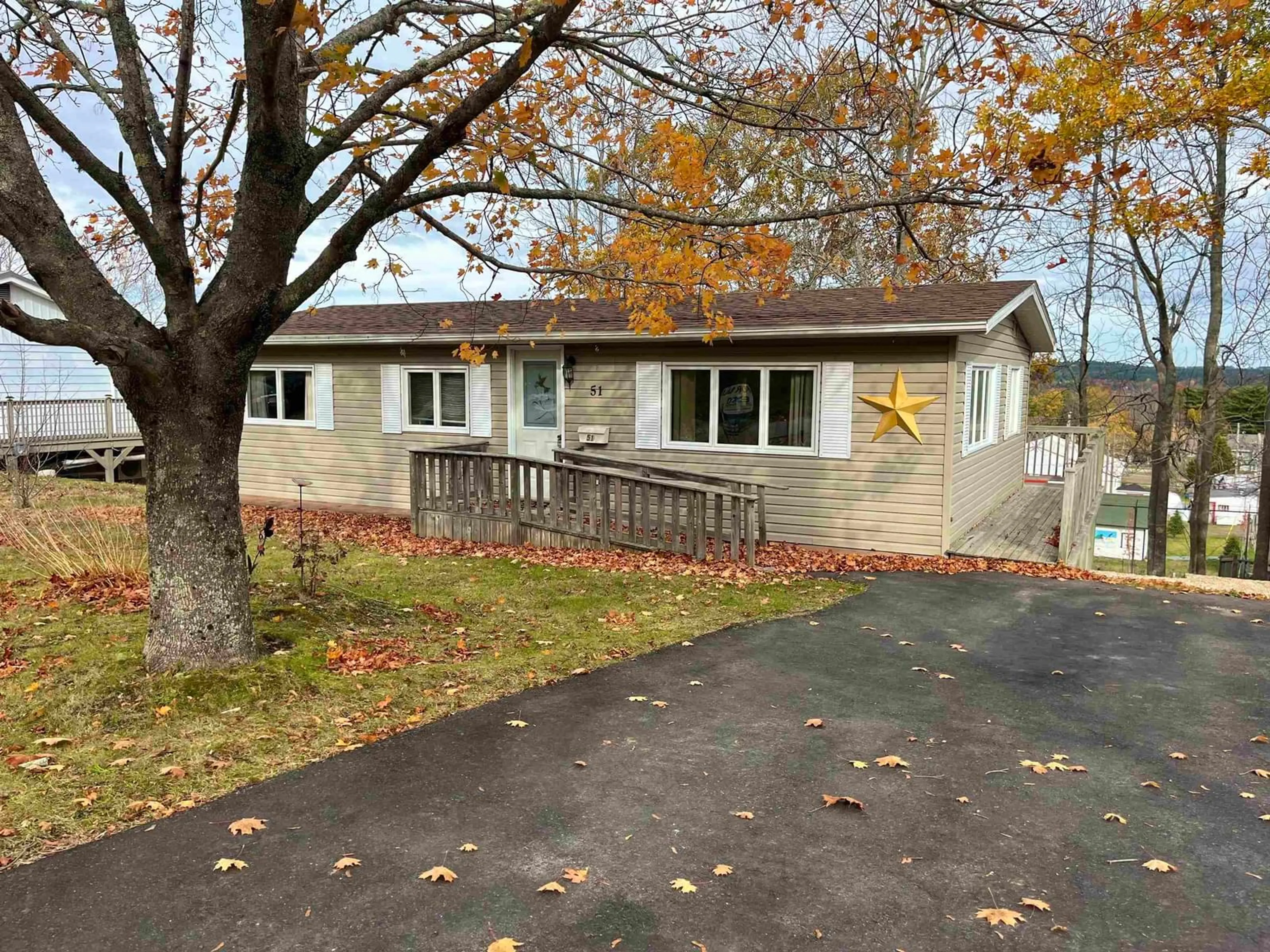 Home with vinyl exterior material, street for 51 Micmac Ave, Bridgewater Nova Scotia B4V 1M3