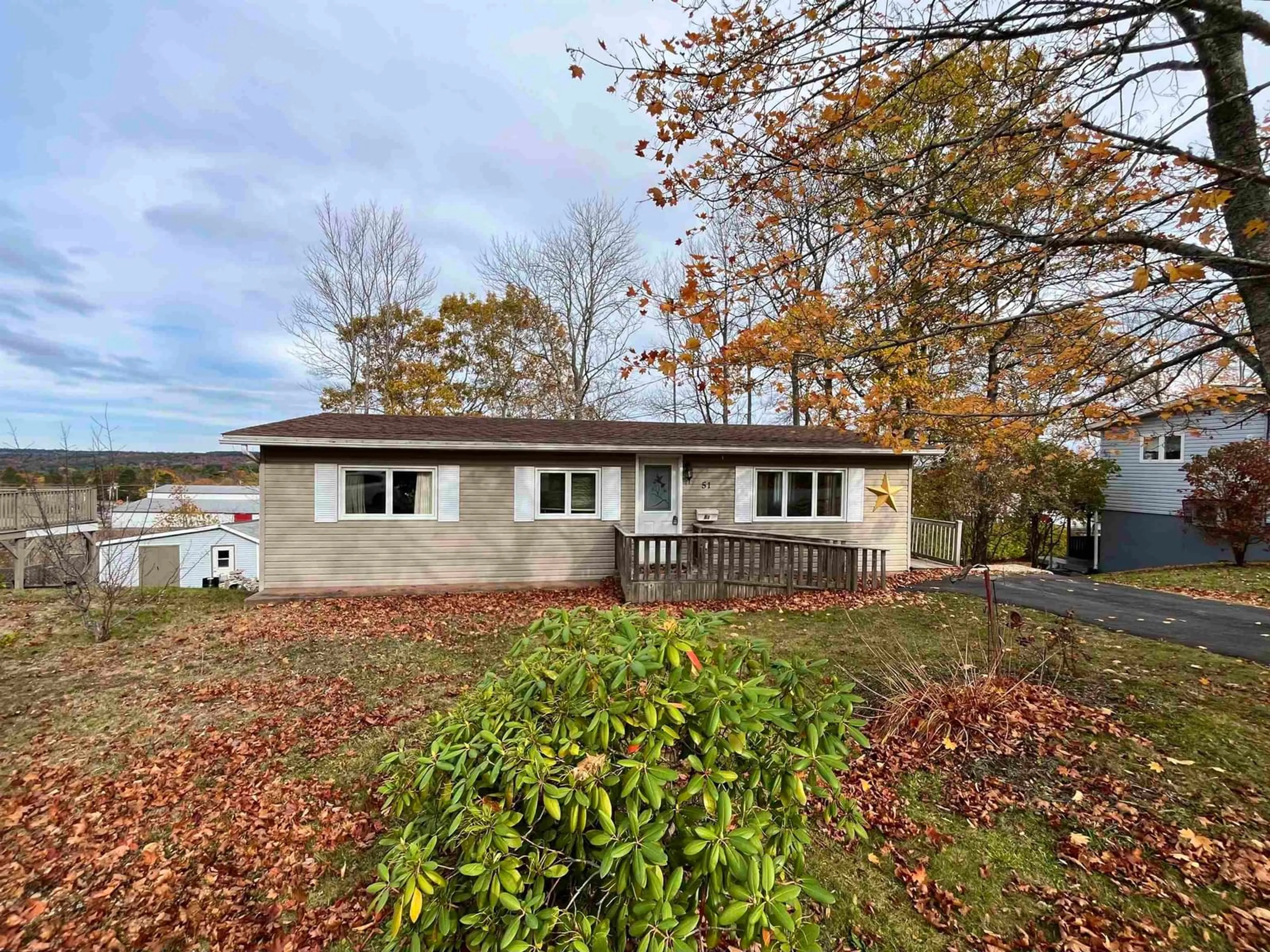 A pic from outside/outdoor area/front of a property/back of a property/a pic from drone, unknown for 51 Micmac Ave, Bridgewater Nova Scotia B4V 1M3