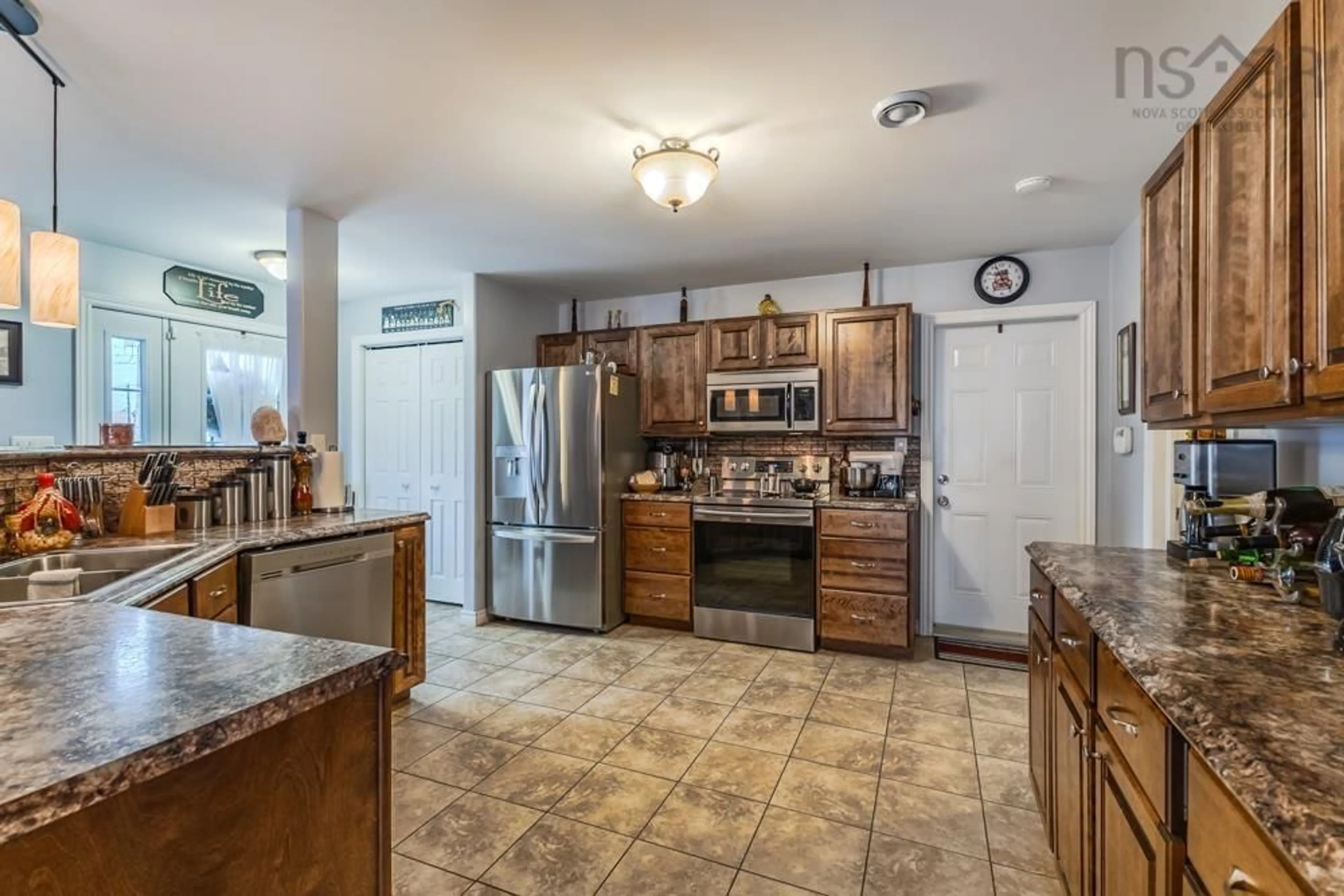 Open concept kitchen, ceramic/tile floor for 32 Palaeo Dr, Debert Nova Scotia B0M 1G0