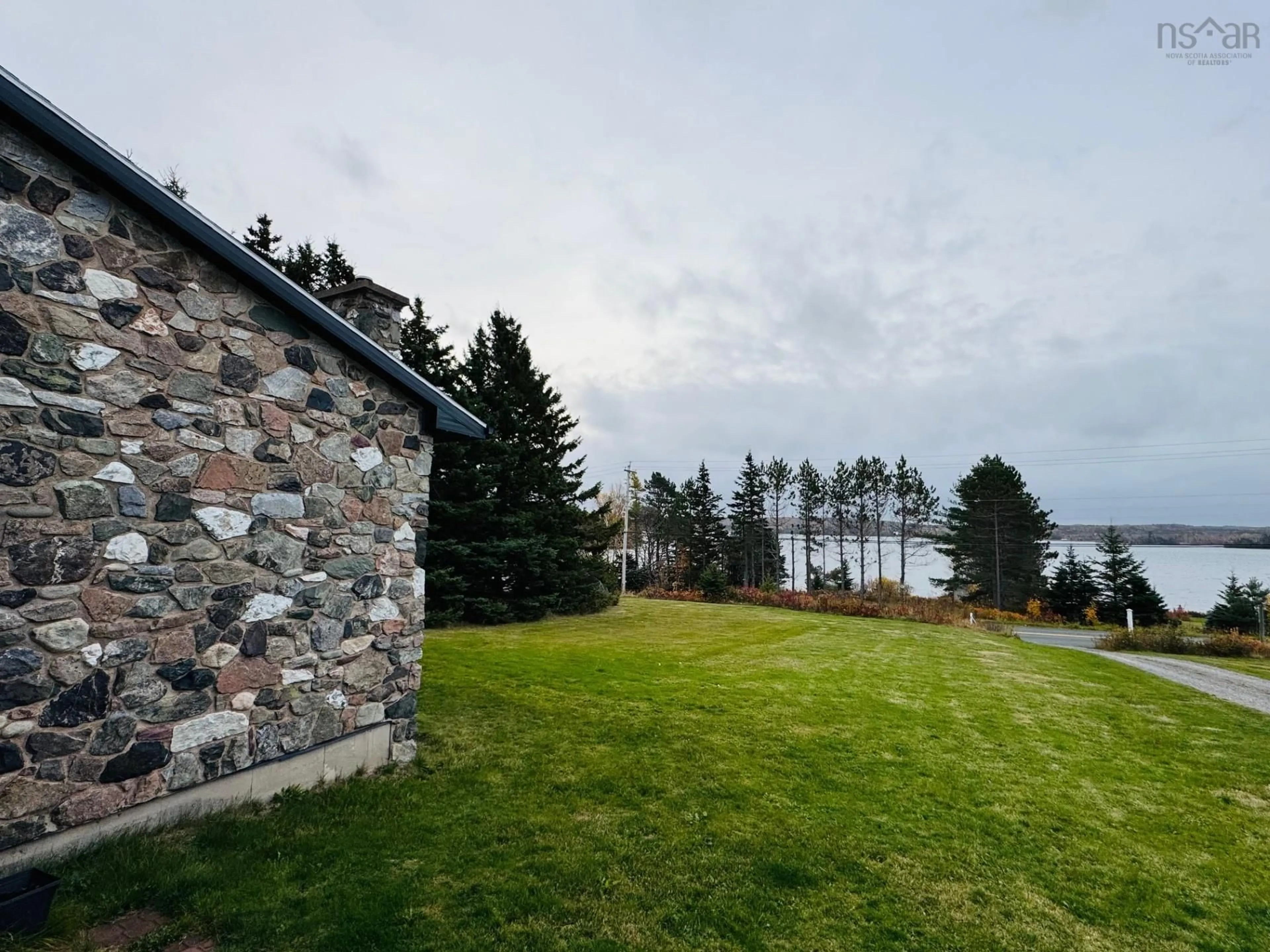 A pic from outside/outdoor area/front of a property/back of a property/a pic from drone, water/lake/river/ocean view for 430 Hillside Rd, Albert Bridge Nova Scotia B1K 3J1