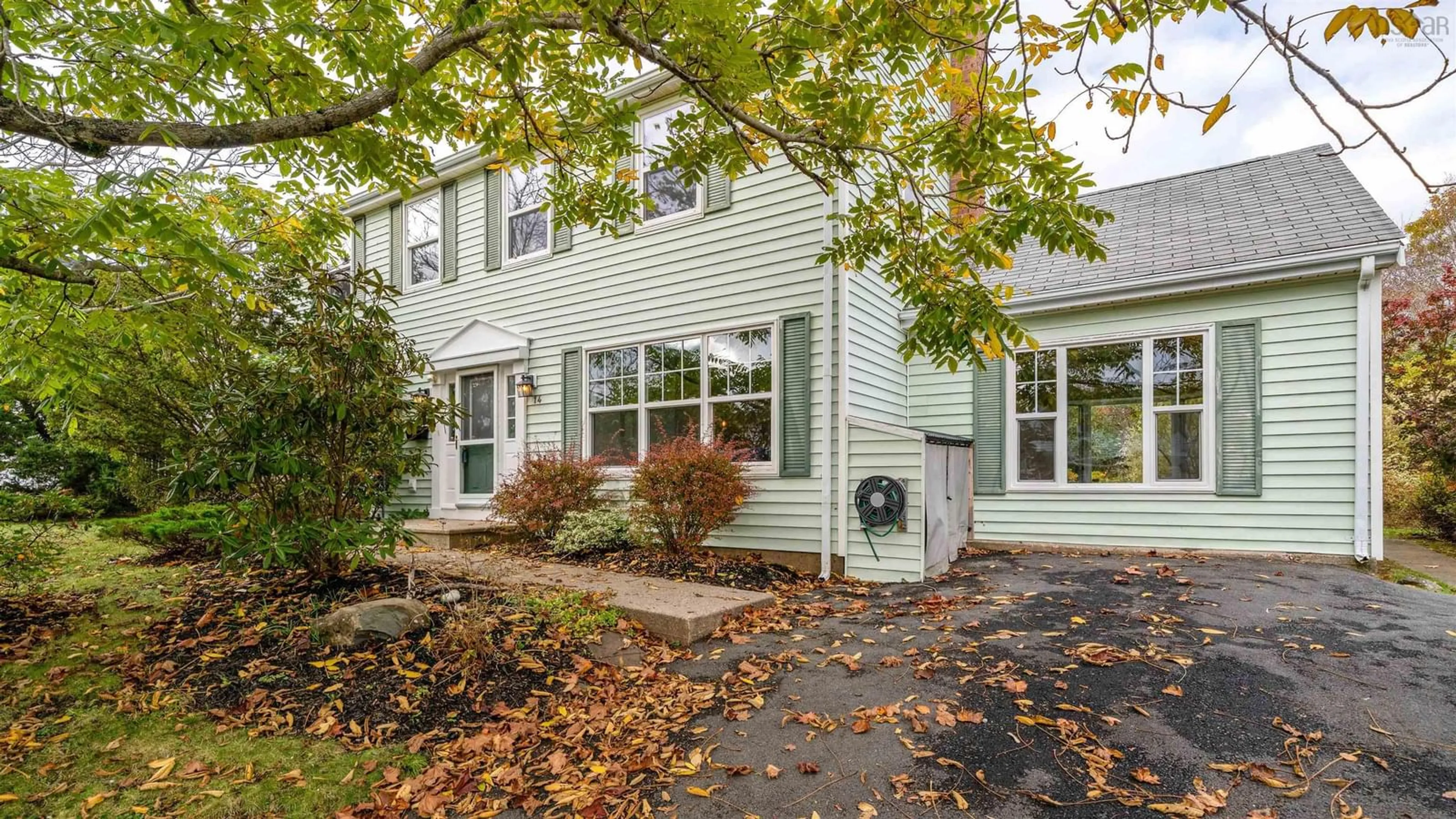 Home with vinyl exterior material, street for 14 Regal Rd, Dartmouth Nova Scotia B2W 4Z7