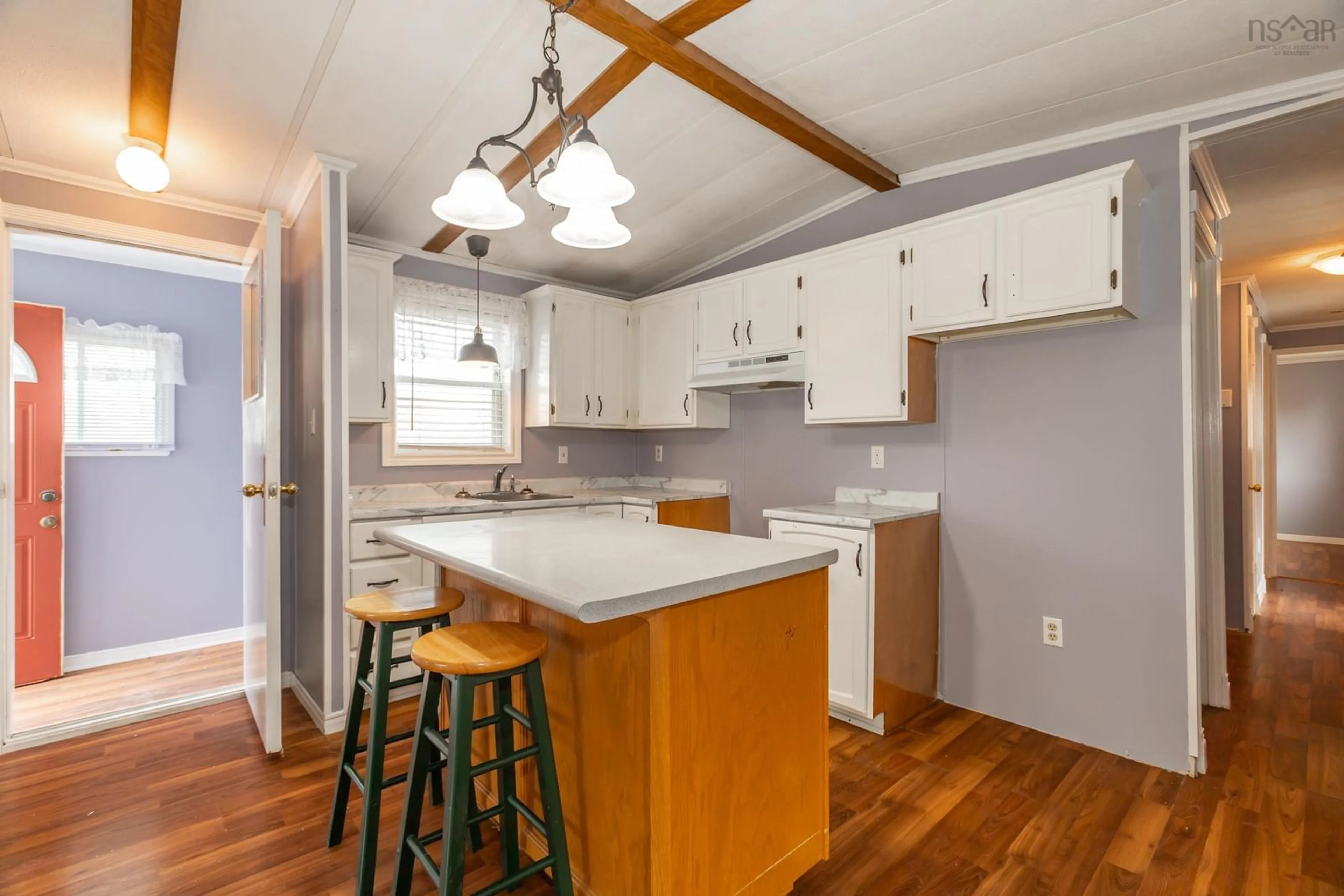 Open concept kitchen, wood/laminate floor for 8894 Highway 201, Nictaux Nova Scotia B0S 1P0