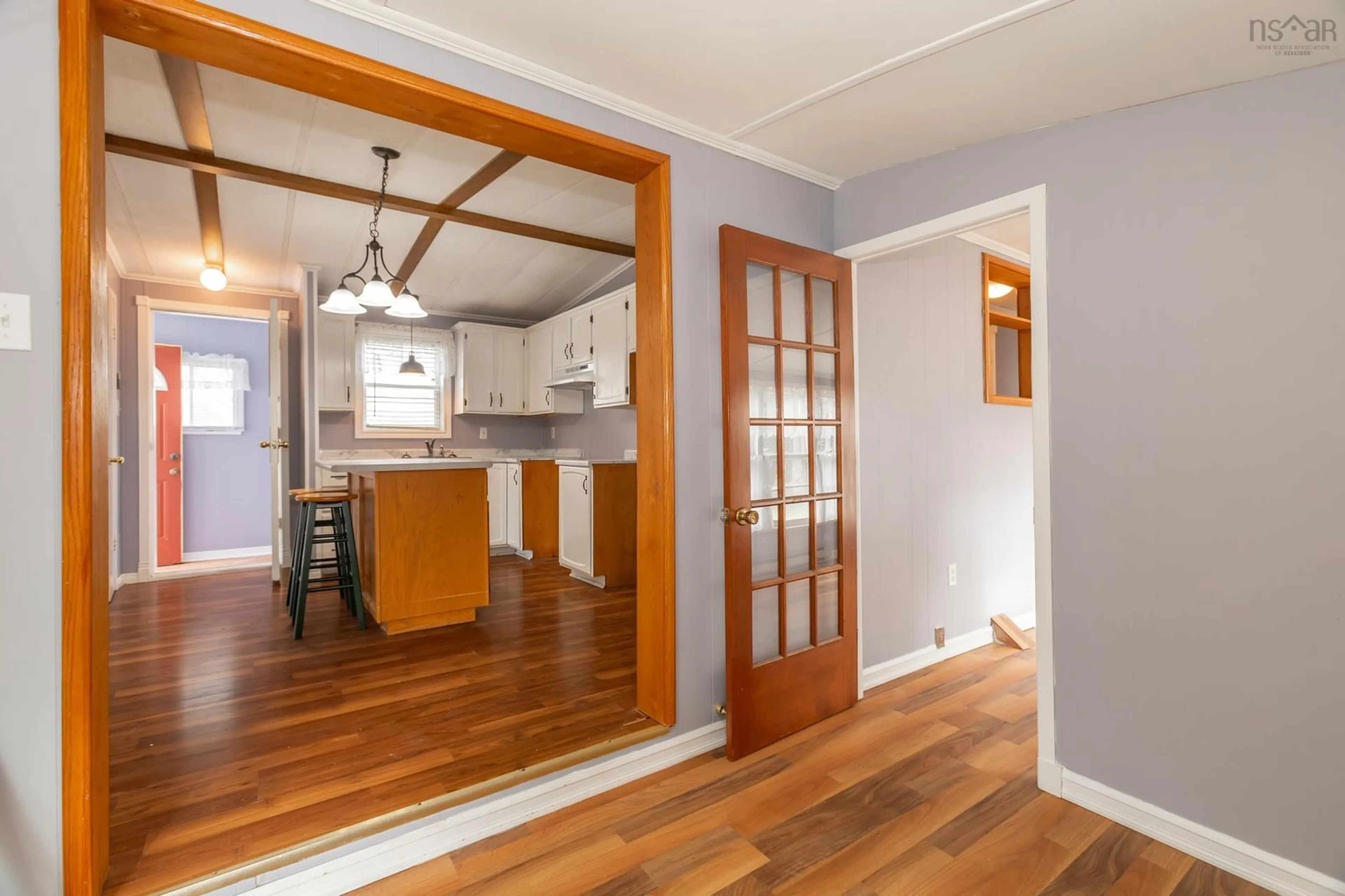 Open concept kitchen, wood/laminate floor for 8894 Highway 201, Nictaux Nova Scotia B0S 1P0