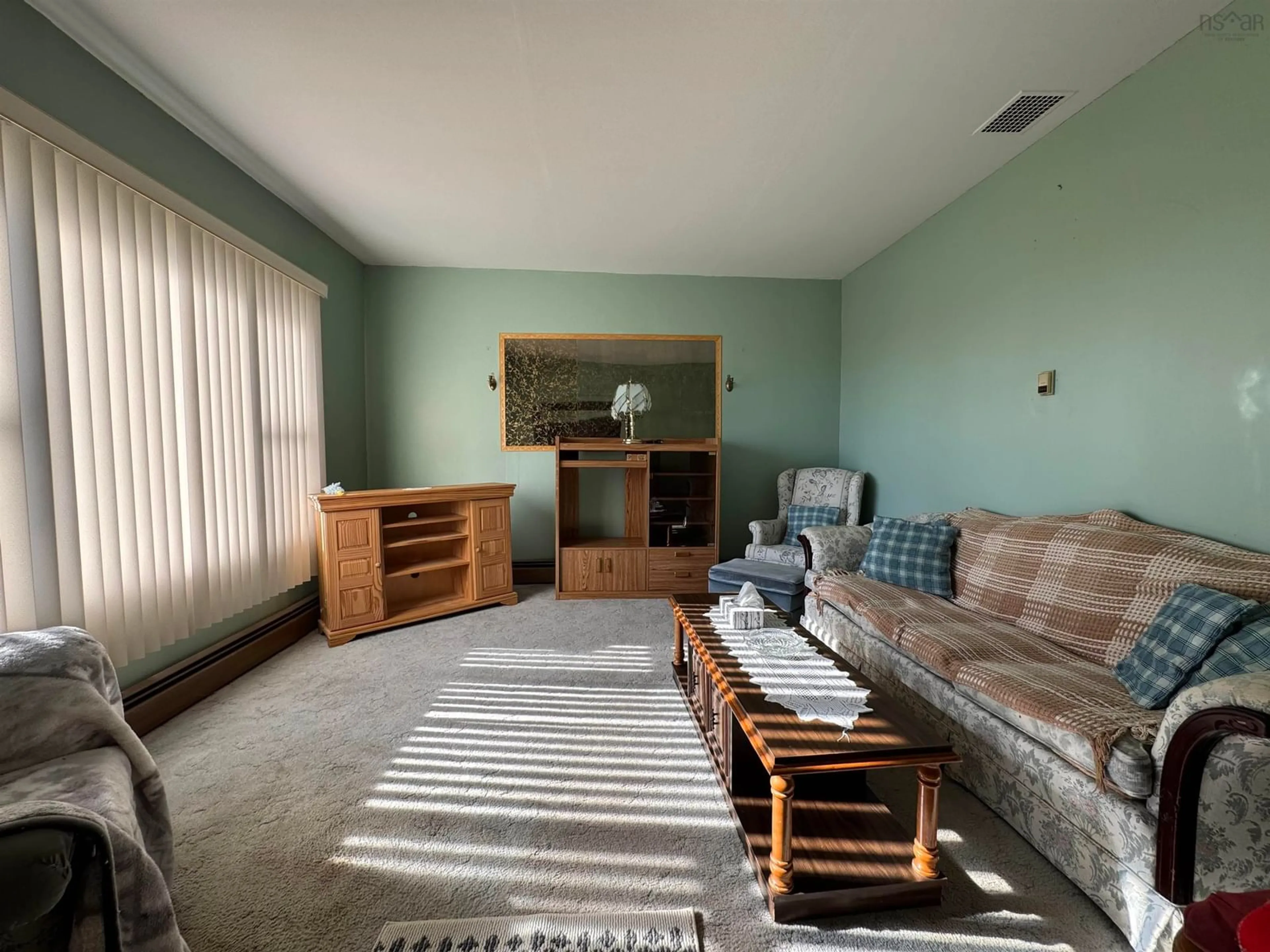 Living room with furniture, unknown for 37 Kent St, Louisbourg Nova Scotia B1C 1G2