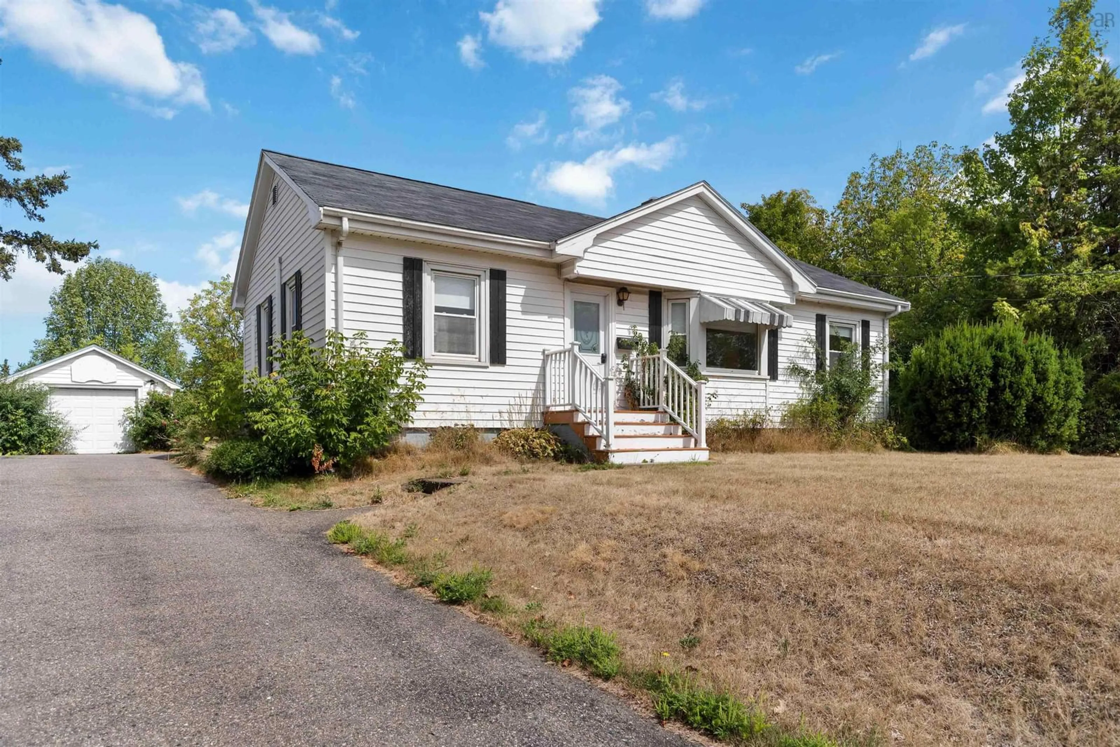 Home with vinyl exterior material, street for 9643 Commercial St, New Minas Nova Scotia B4N 3G6