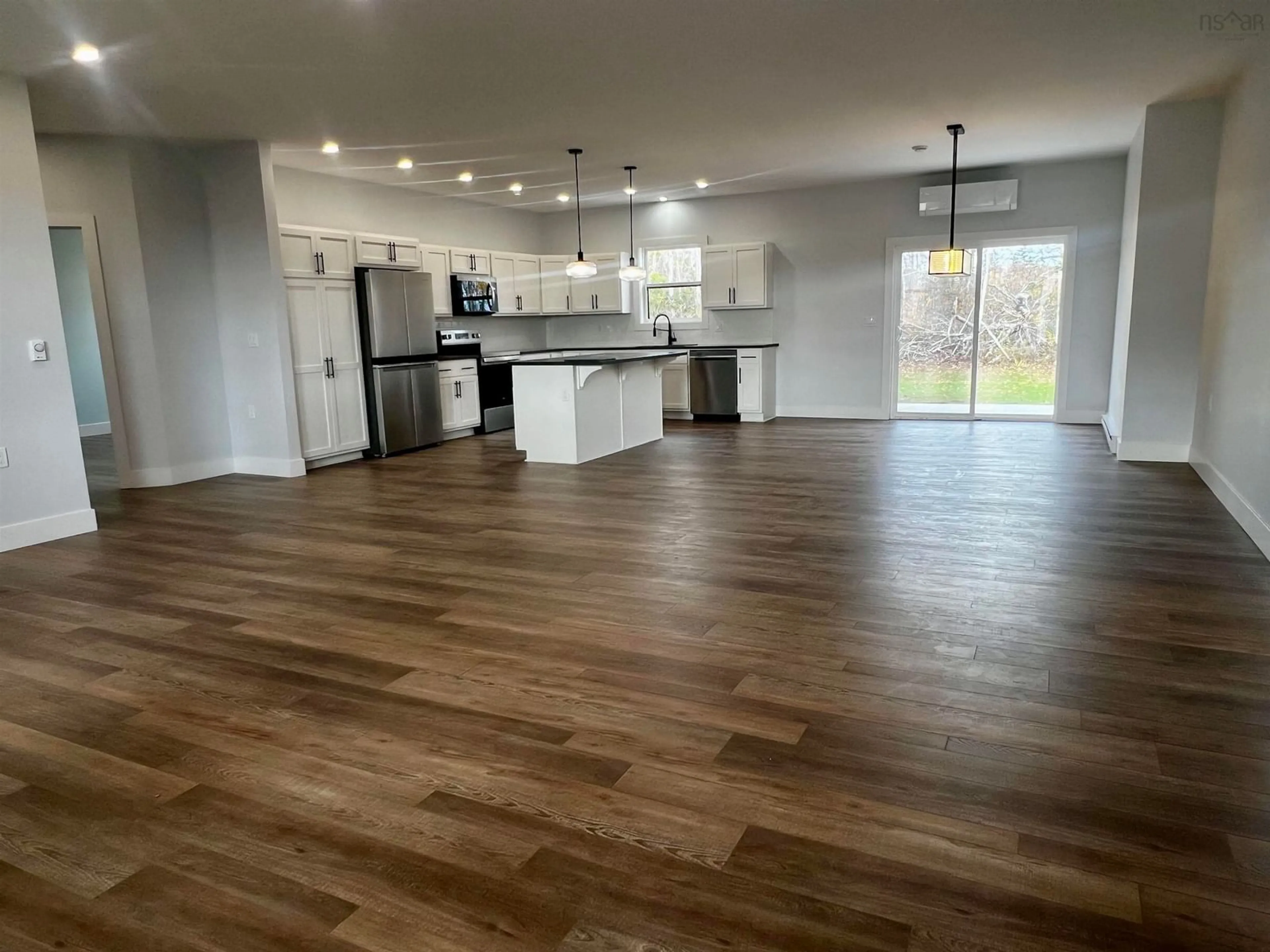 Open concept kitchen, wood/laminate floor for 34 Centennial Dr, Abercrombie Nova Scotia B2H 5C4