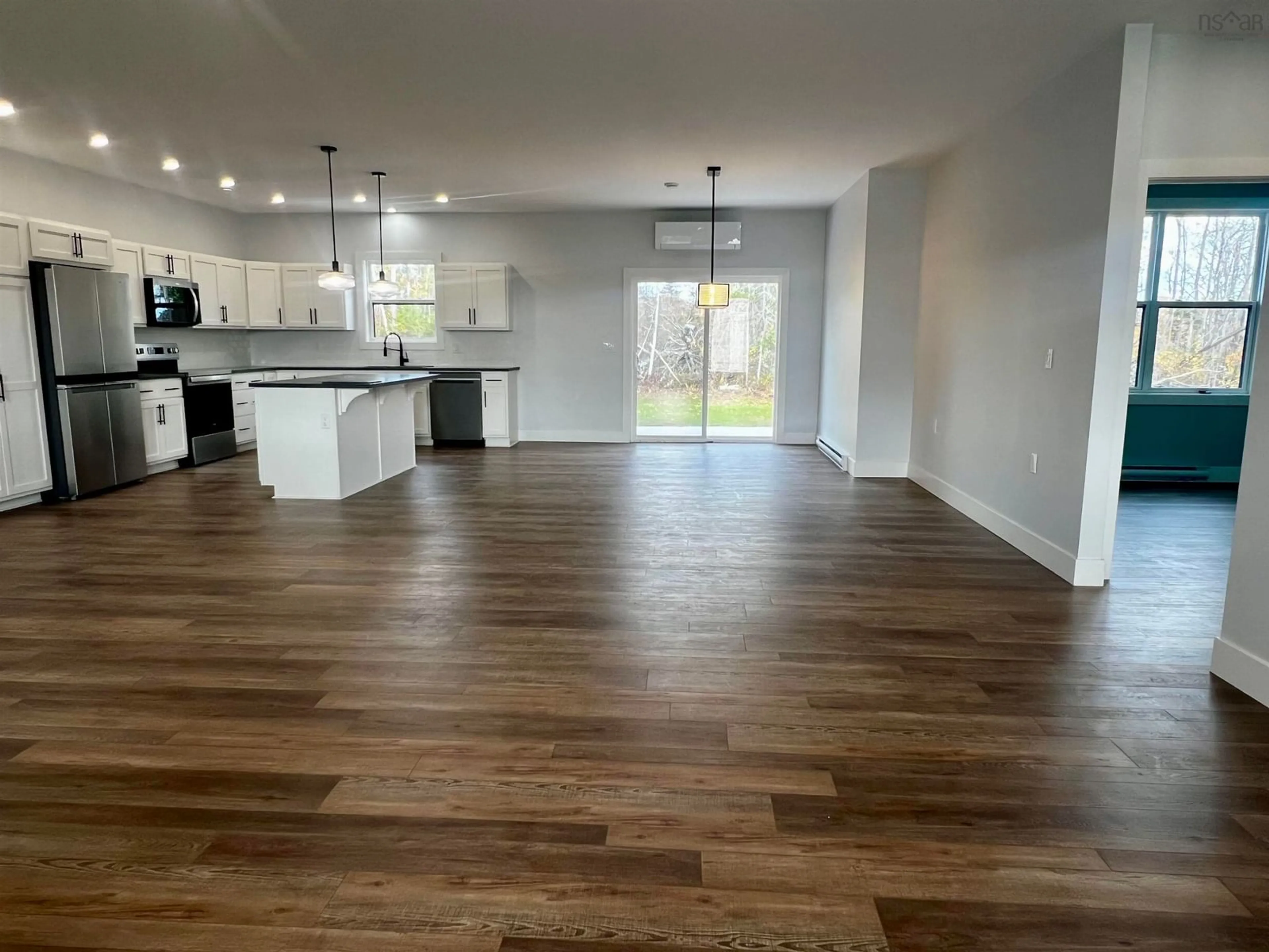 Open concept kitchen, wood/laminate floor for 34 Centennial Dr, Abercrombie Nova Scotia B2H 5C4