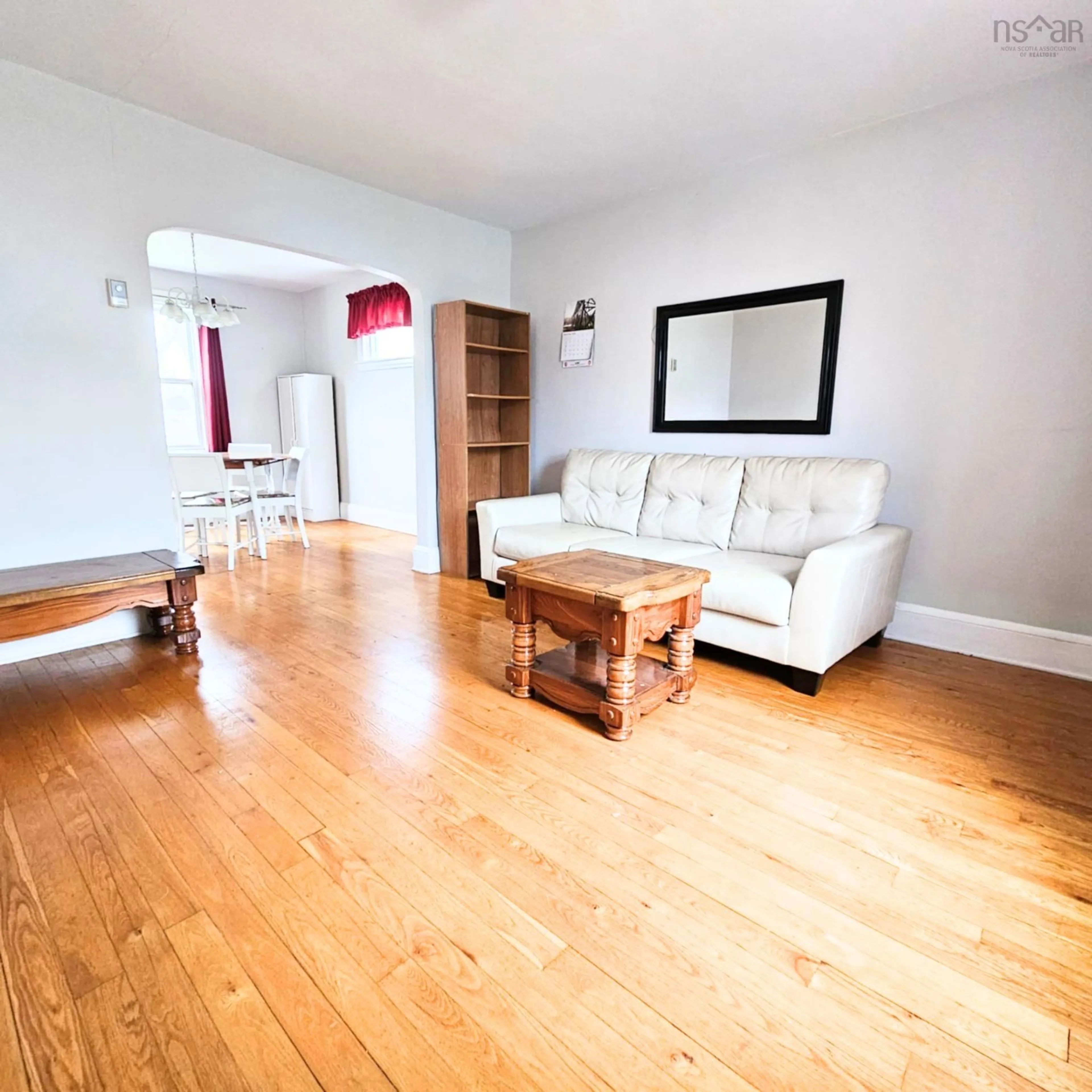 Living room with furniture, wood/laminate floor for 417 Chestnut Dr, Sydney Nova Scotia B1P 4Z1