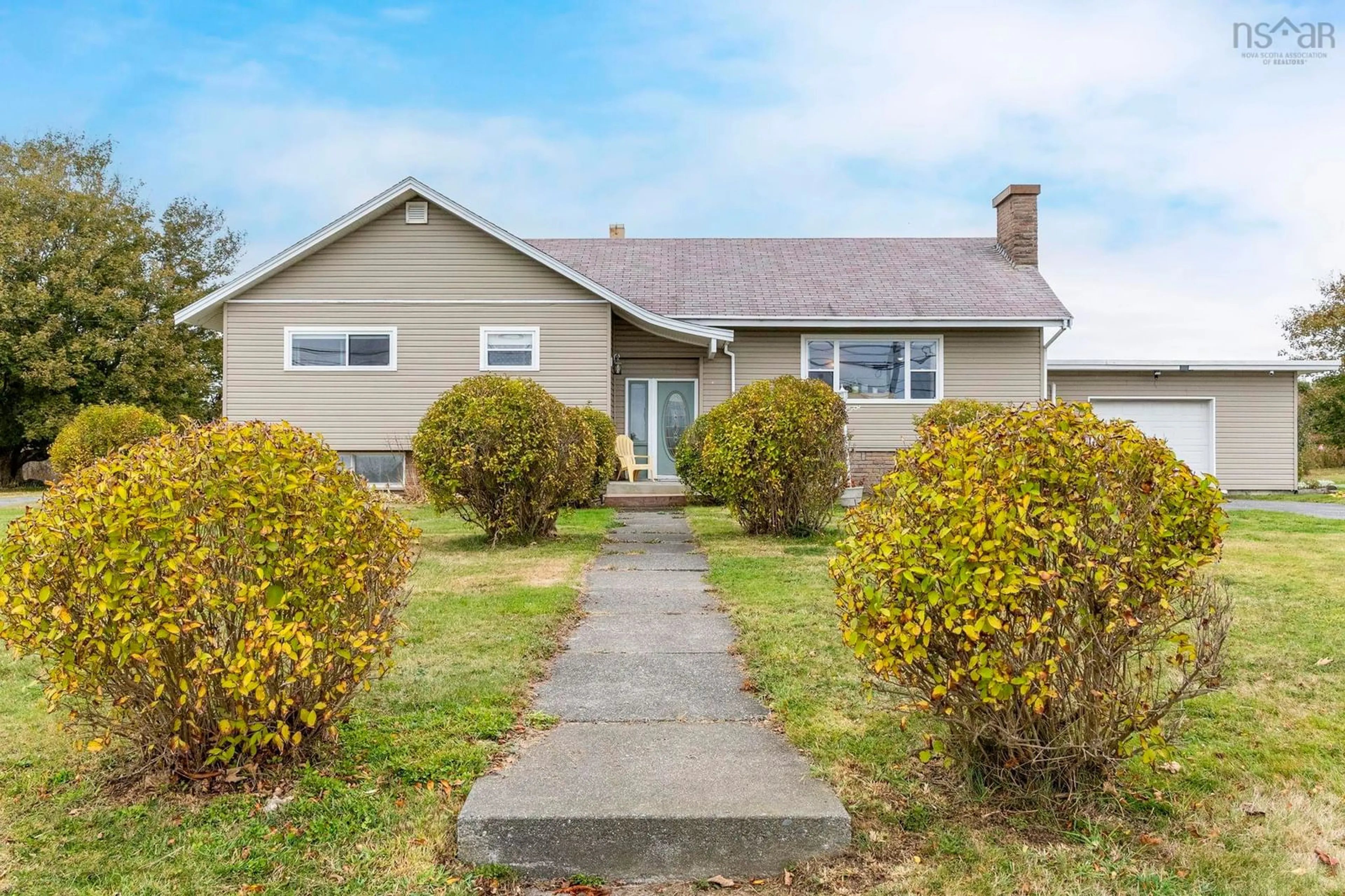 Home with vinyl exterior material, street for 1358 Hwy 1, Church Point Nova Scotia B0W 1M0