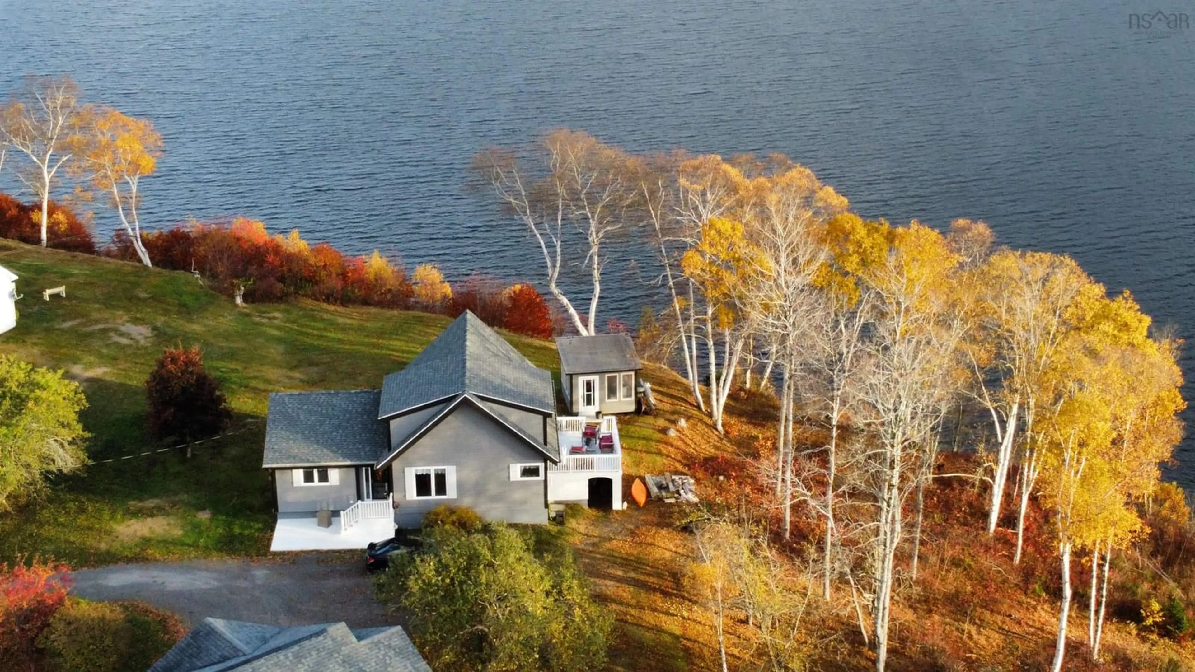 A pic from outside/outdoor area/front of a property/back of a property/a pic from drone, water/lake/river/ocean view for 16147 316 Hwy, Country Harbour Mines Nova Scotia B0H 1J0