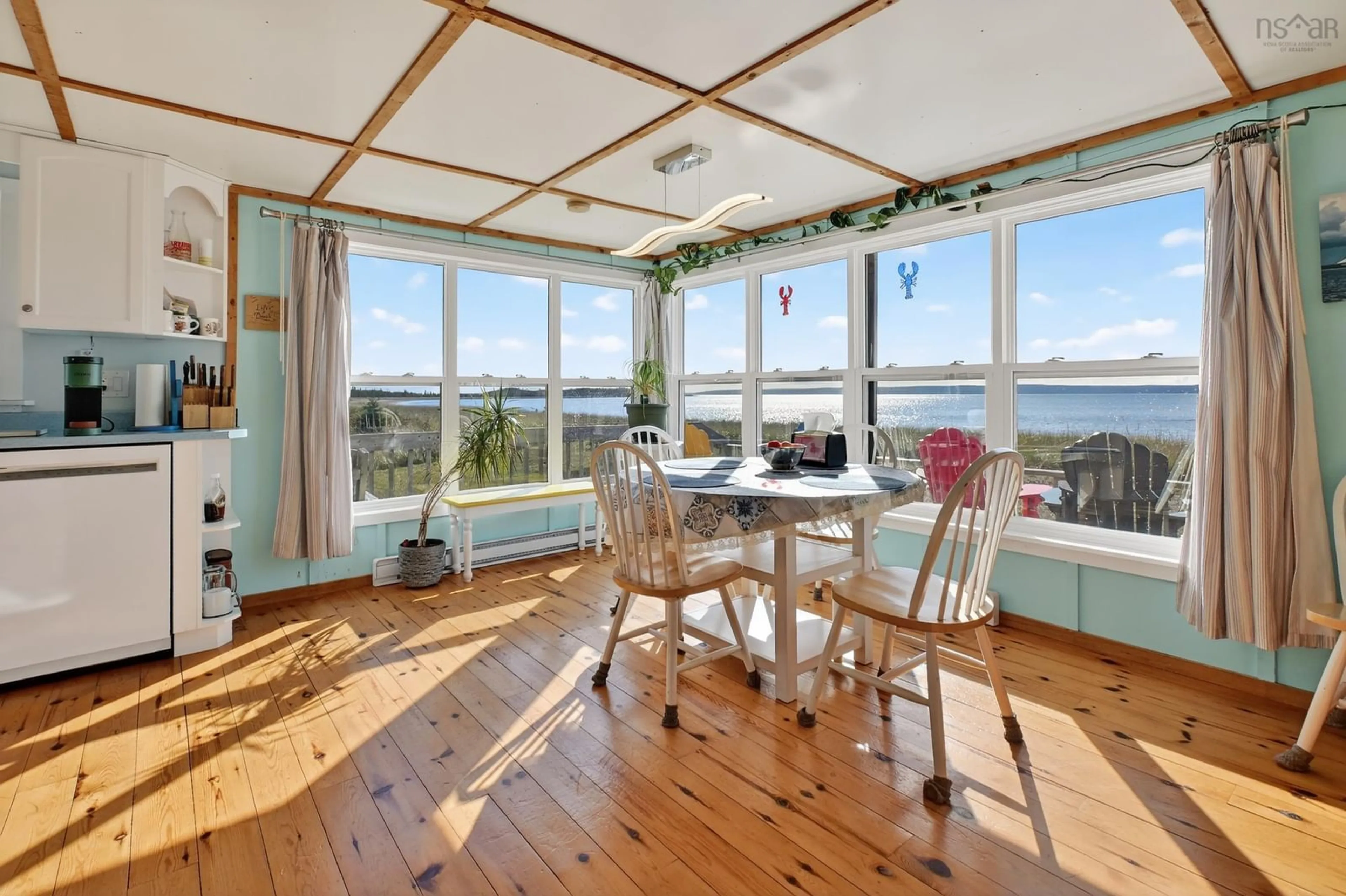 Dining room, wood/laminate floor for 73 Gradys Reach Rd, Guysborough County Nova Scotia B0E 2G0