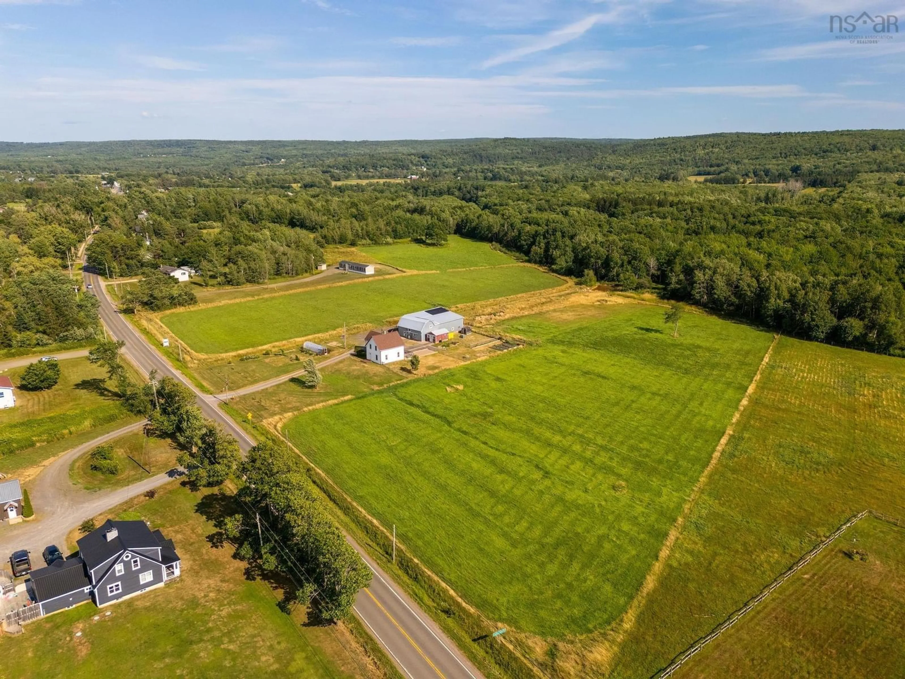 A pic from outside/outdoor area/front of a property/back of a property/a pic from drone, unknown for 710 Main Street, Lawrencetown Nova Scotia B0S 1M0
