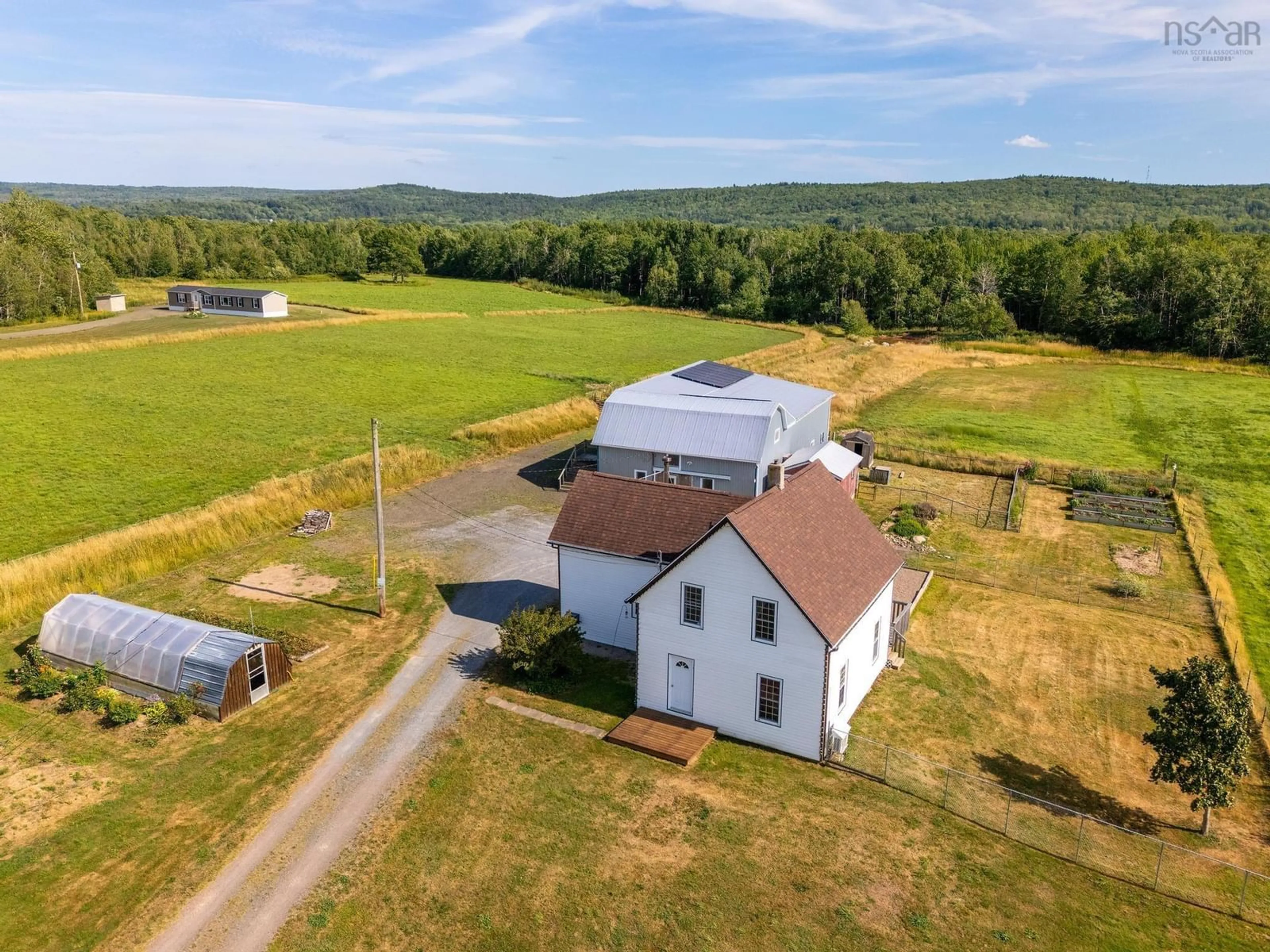 A pic from outside/outdoor area/front of a property/back of a property/a pic from drone, building for 710 Main Street, Lawrencetown Nova Scotia B0S 1M0