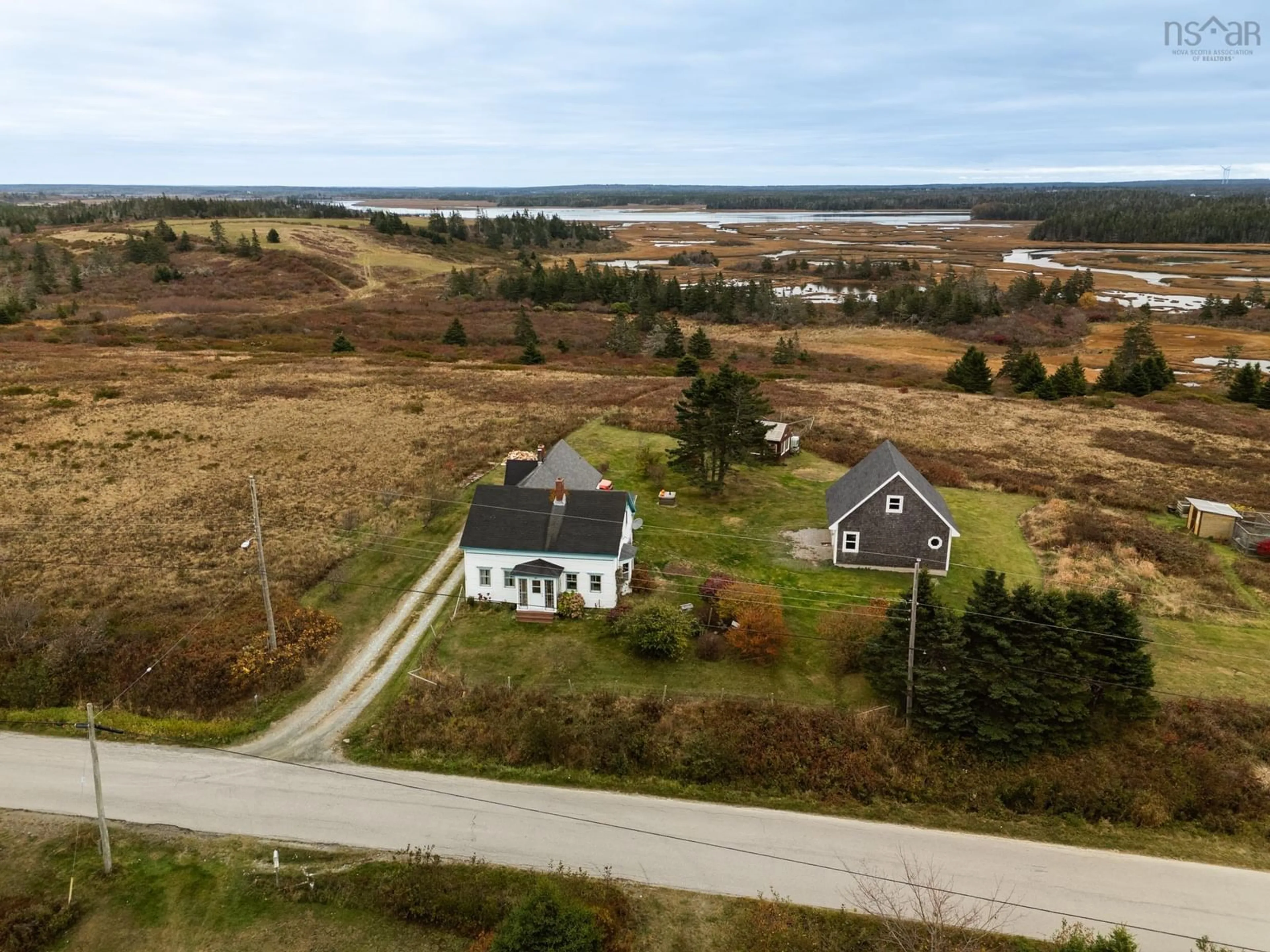 A pic from outside/outdoor area/front of a property/back of a property/a pic from drone, water/lake/river/ocean view for 129 Chebogue Point Rd, Rockville Nova Scotia B5A 5E8