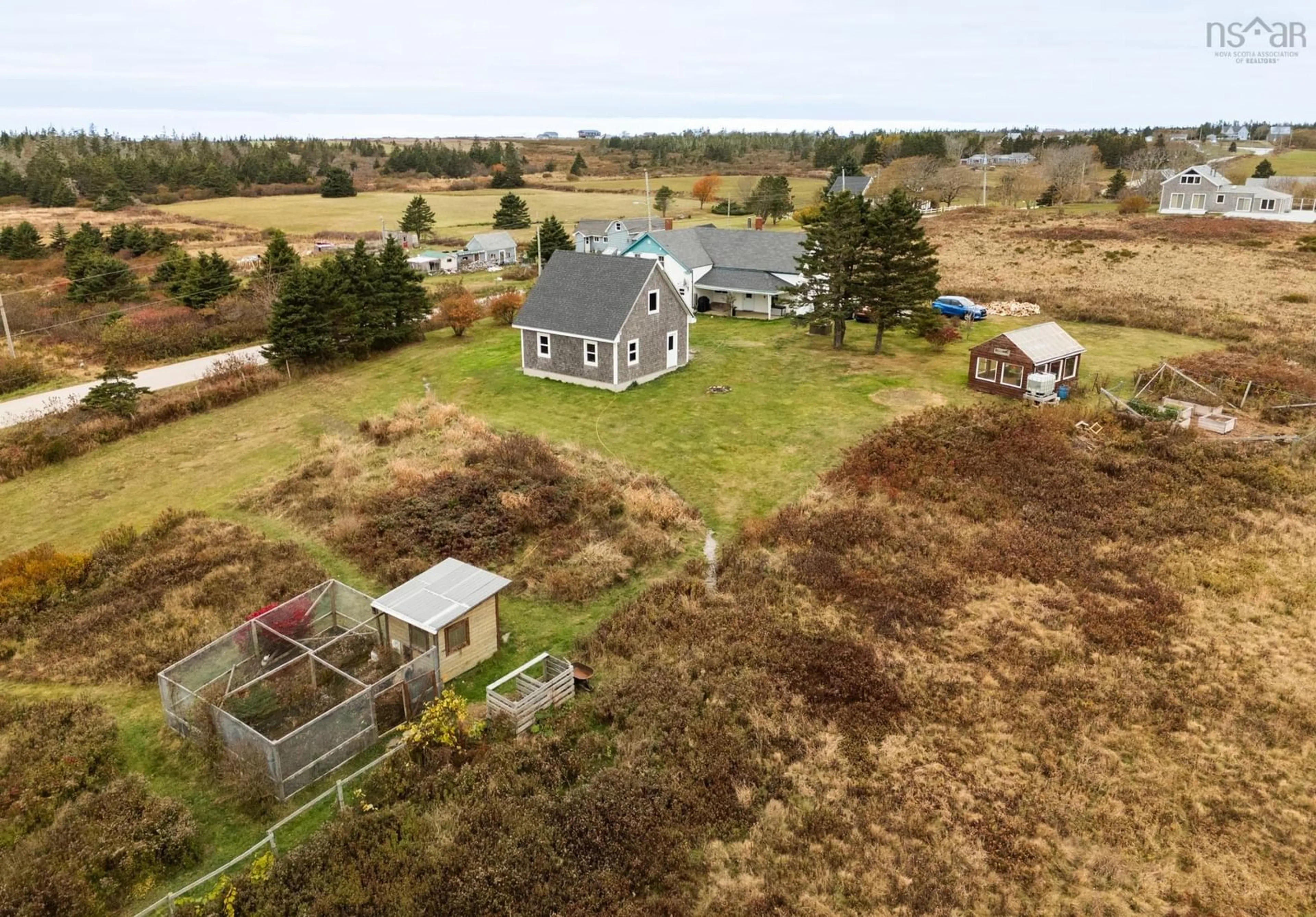 A pic from outside/outdoor area/front of a property/back of a property/a pic from drone, water/lake/river/ocean view for 129 Chebogue Point Rd, Rockville Nova Scotia B5A 5E8